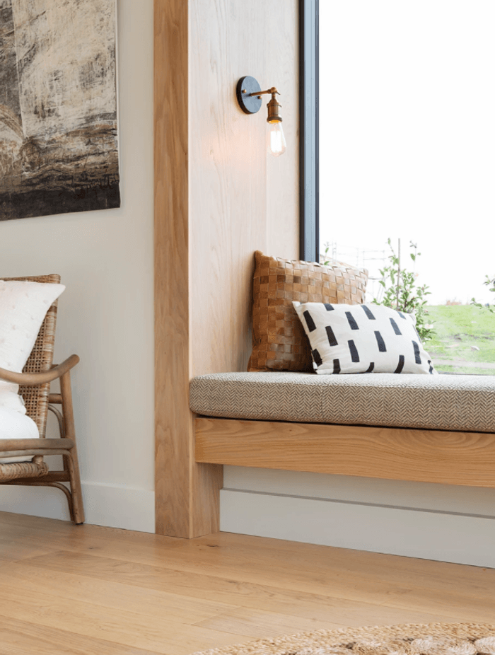 2016 Thorne Group showhome (above) utilises a transitioning space to the lounge for both a study nook and window seat.