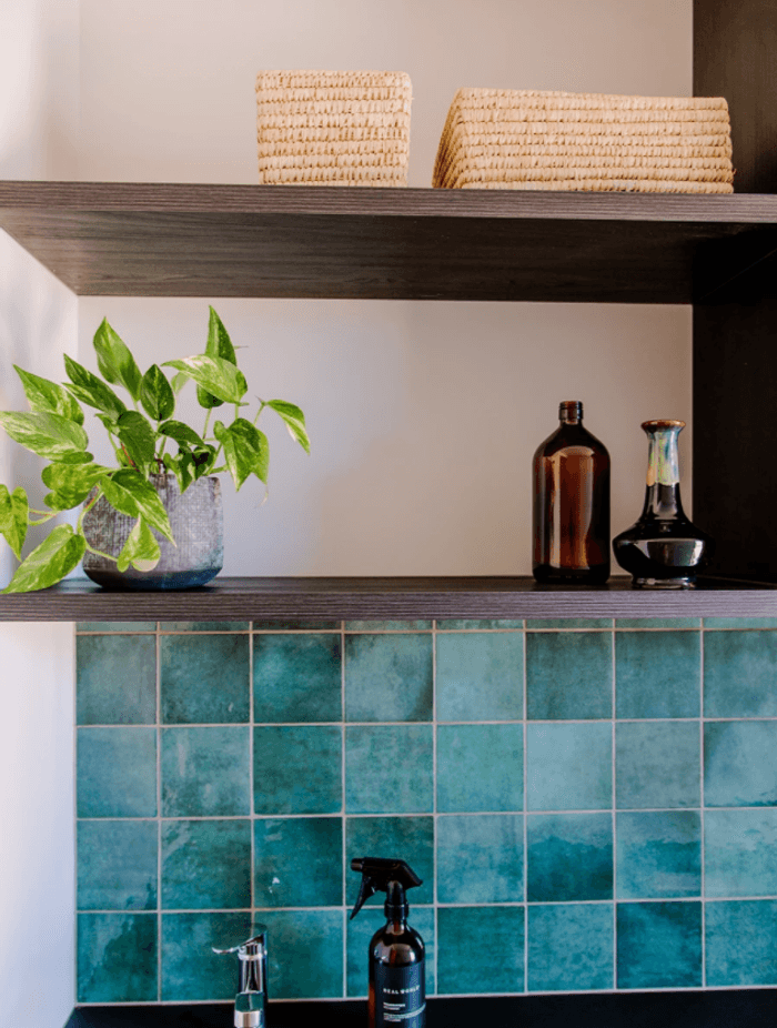Designed laundry space in garage hallway at current Thorne Group showhome (above)