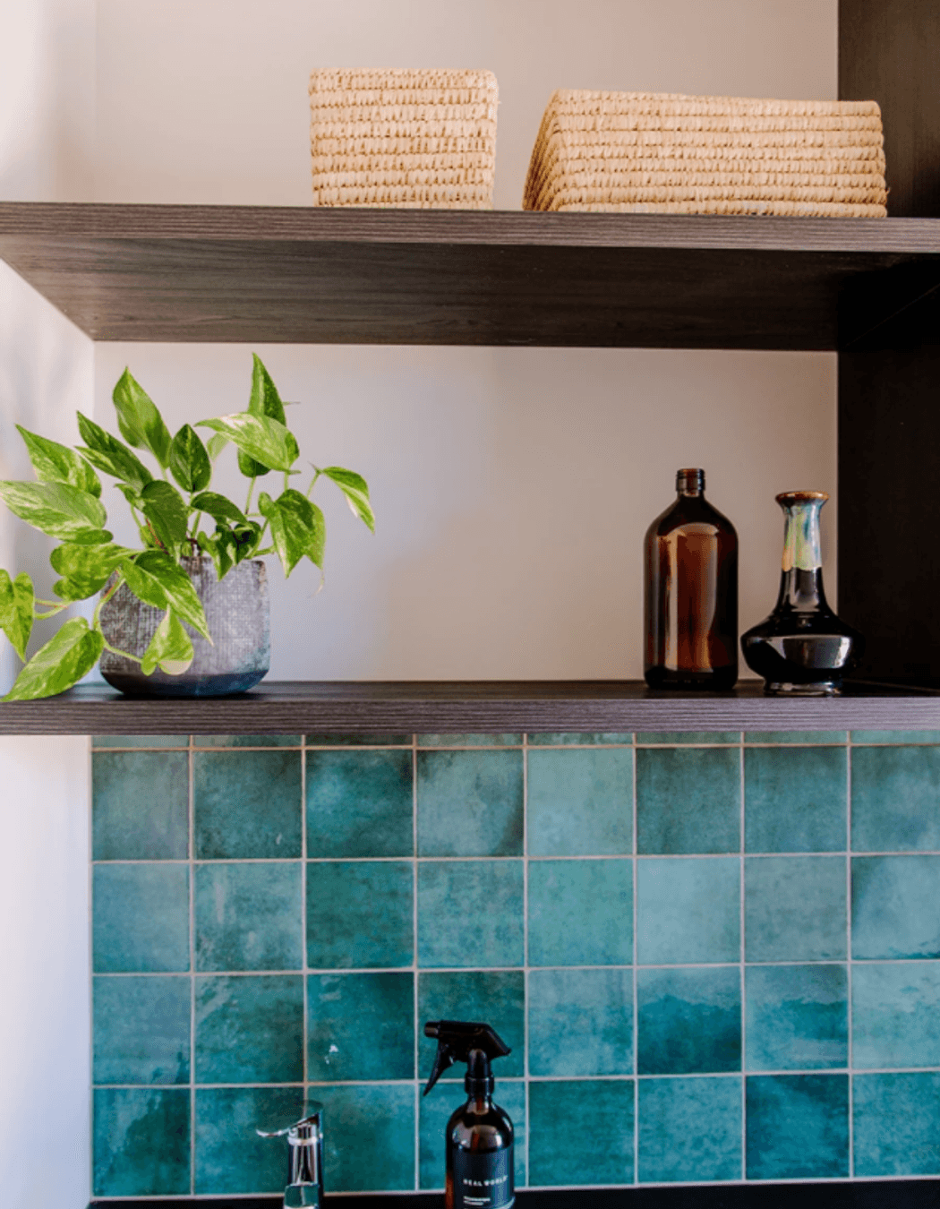 Designed laundry space in garage hallway at current Thorne Group showhome (above)