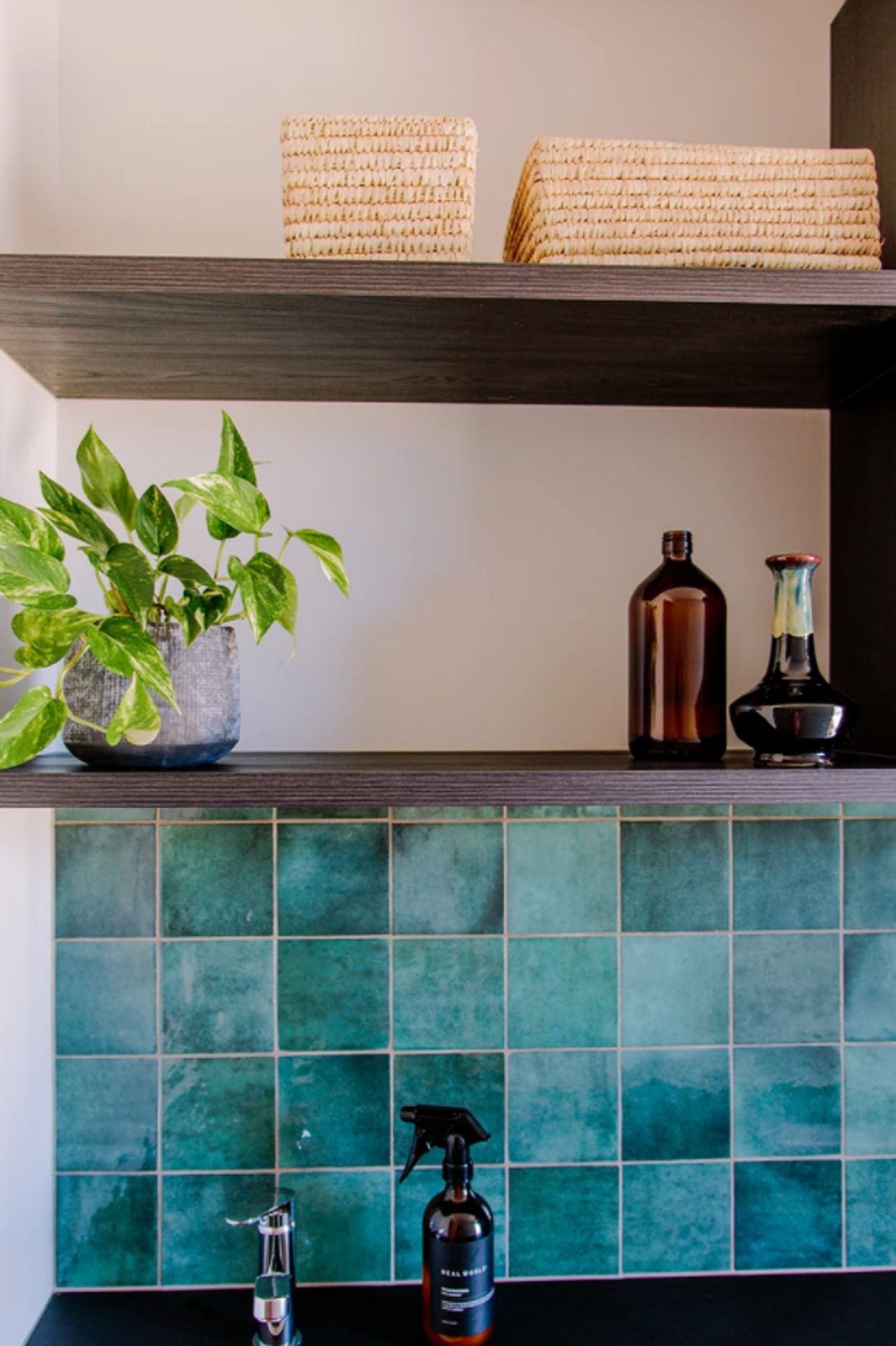 Designed laundry space in garage hallway at current Thorne Group showhome (above)