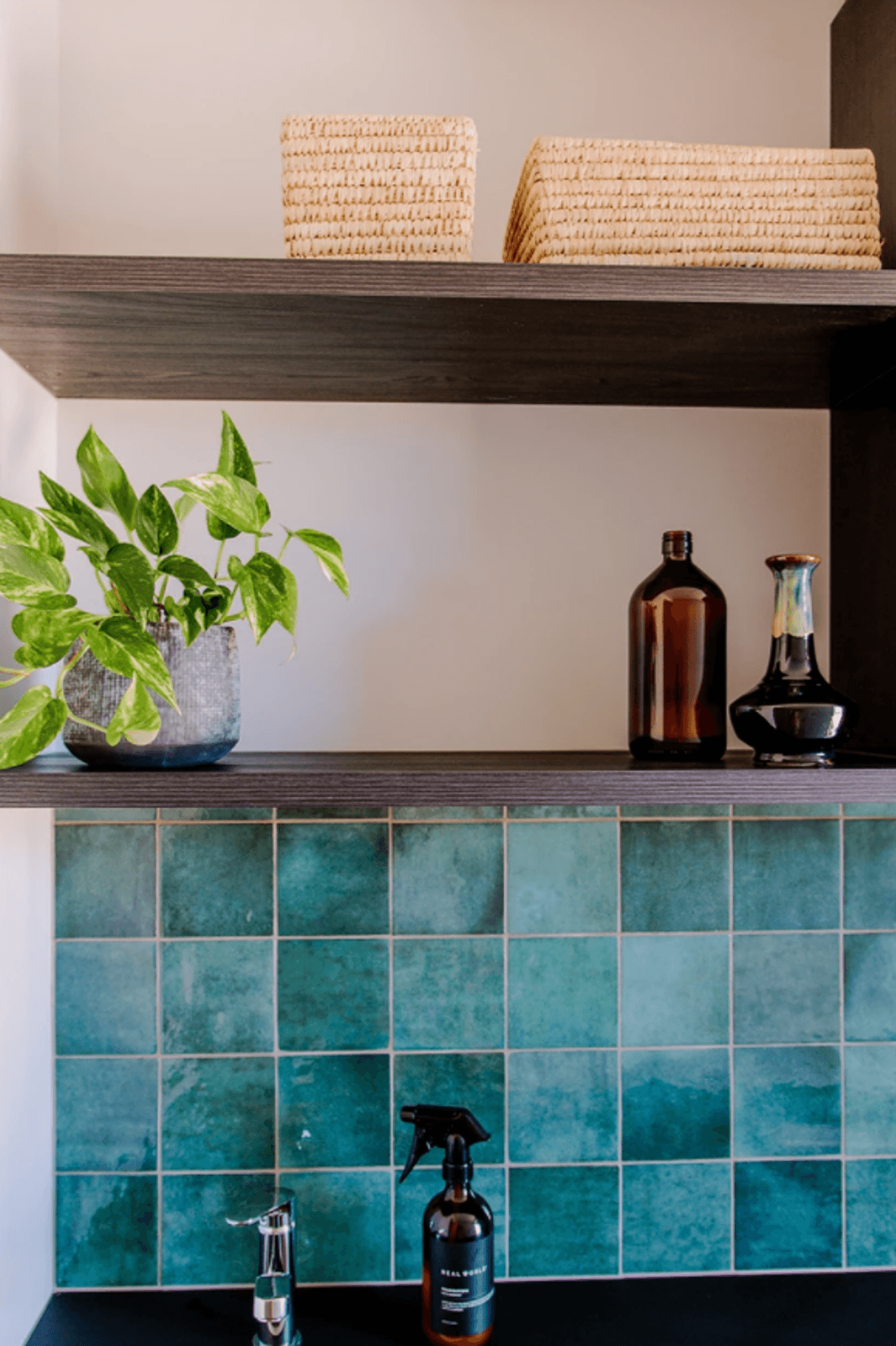 Designed laundry space in garage hallway at current Thorne Group showhome (above)