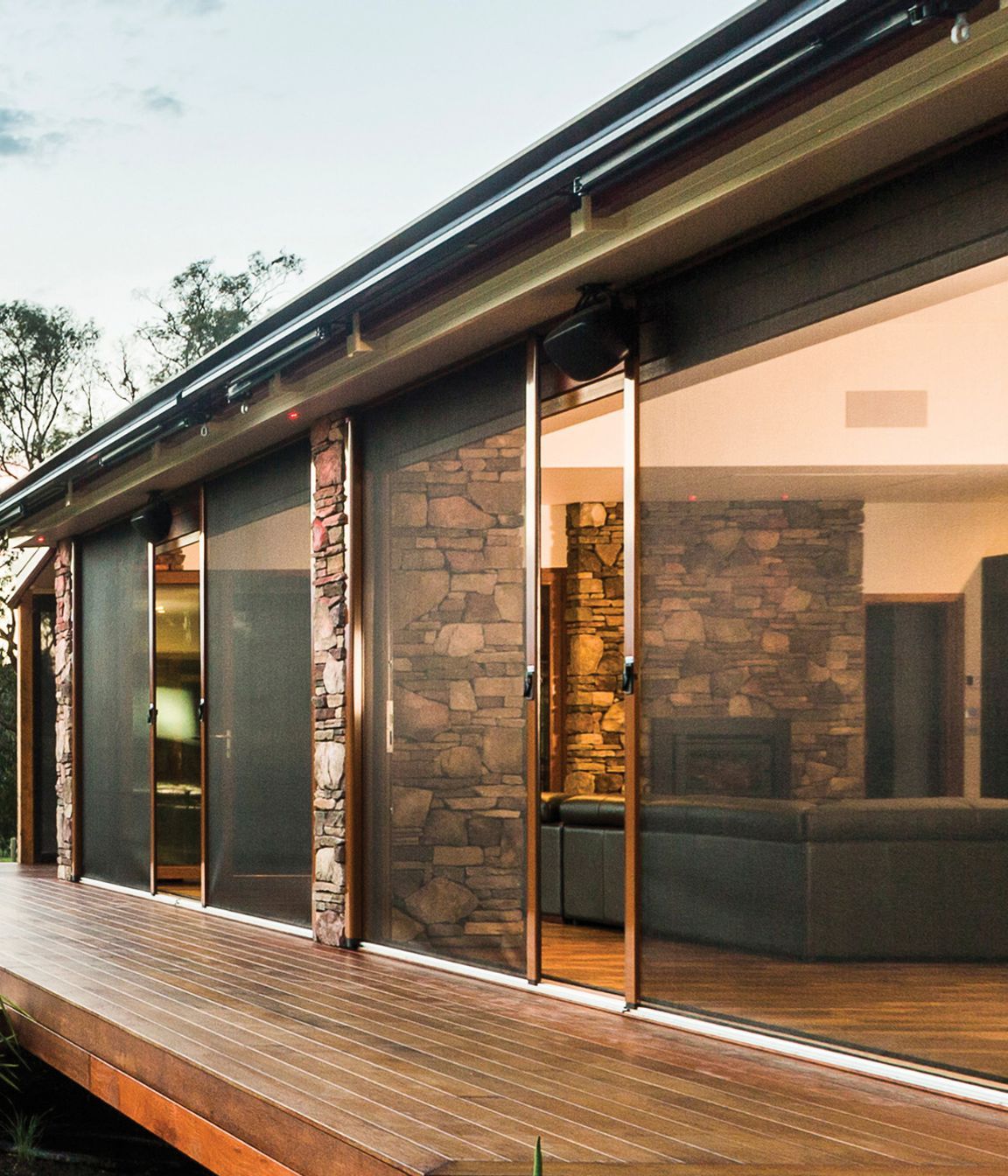 Caption: A Securo side roll blind operates just like a sliding door for ease of access. Here it is shown in Phiferglass insect screen fabric.