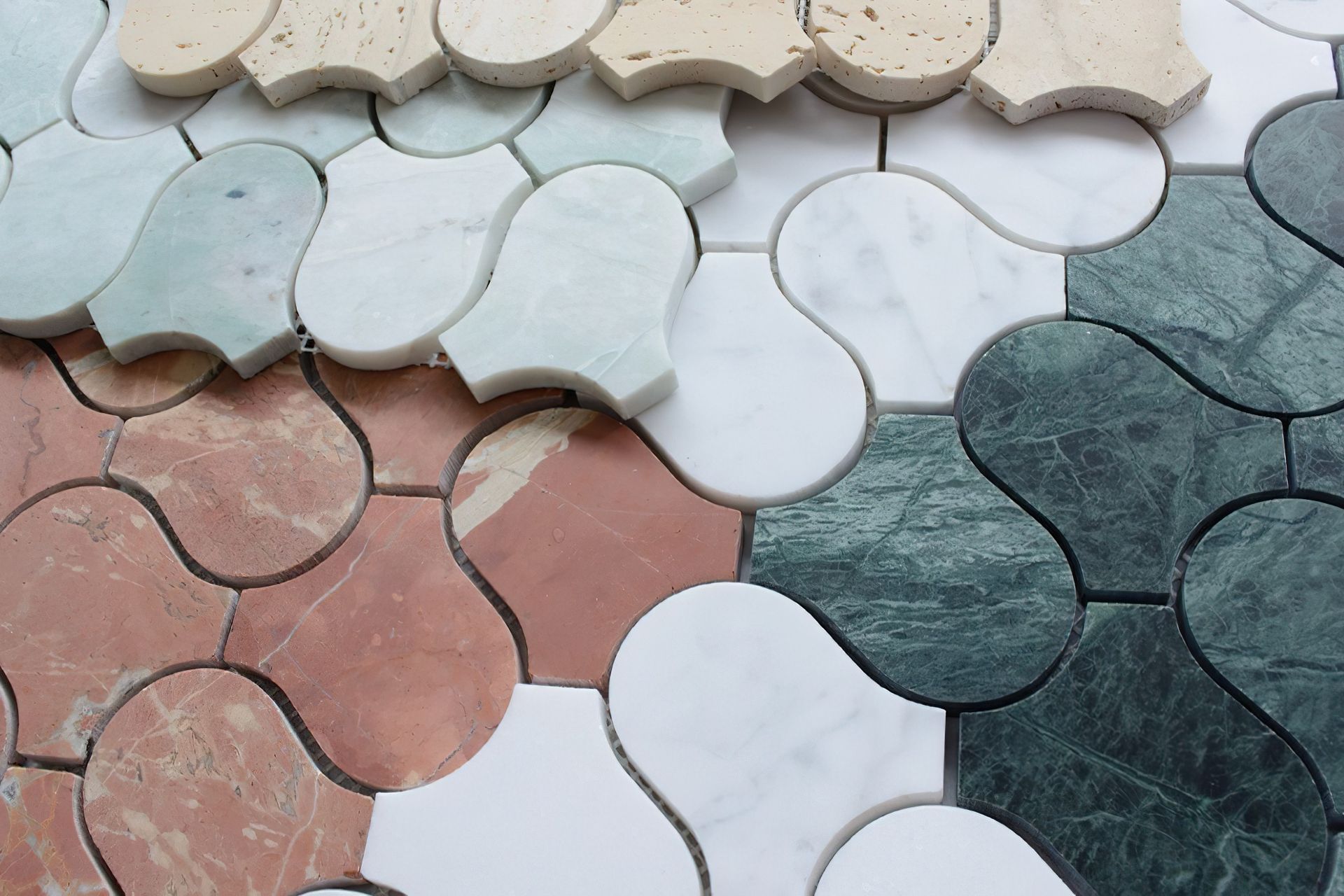 Featuring a lush honed finish, our Serpentine mosaic tile collection includes an endless variety of stone varieties including elegant Ming Marble, Indiana Viridi, Travertine and more.
