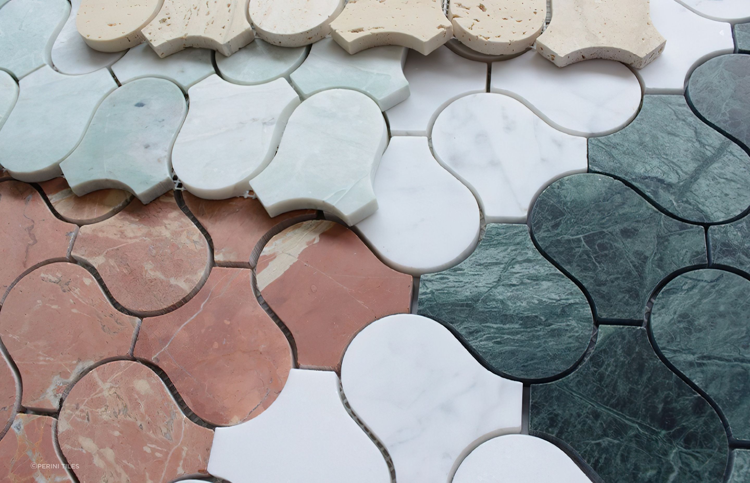 Featuring a lush honed finish, our Serpentine mosaic tile collection includes an endless variety of stone varieties including elegant Ming Marble, Indiana Viridi, Travertine and more.