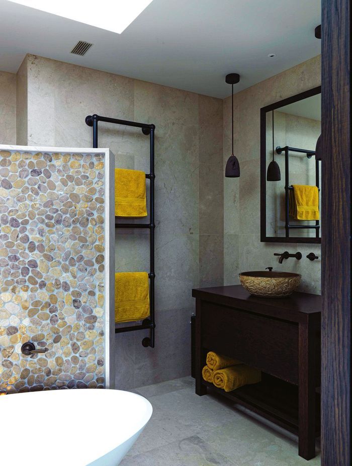 Hayley Dryland of August & Co designed the vanities in the main bedroom, the kitchen cabinetry and much of the other inbuilt furniture, all crafted by Hewe Architectural Cabinetry.
