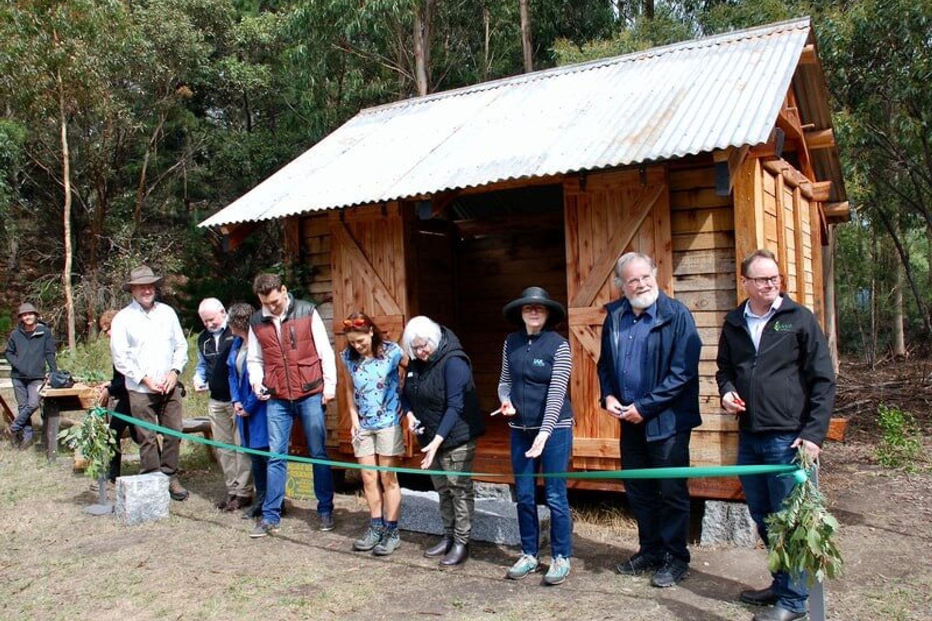 Slab hut launch: economic advantages to grow local for forest communities