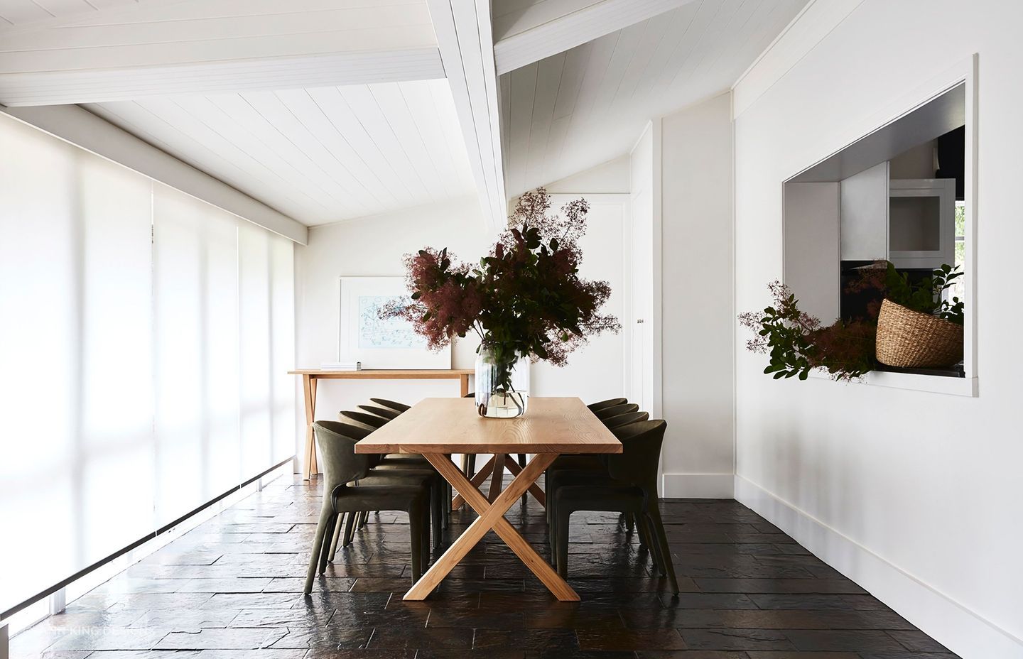A central dining table and plenty of space between each chair are imperative to effective dining room design.