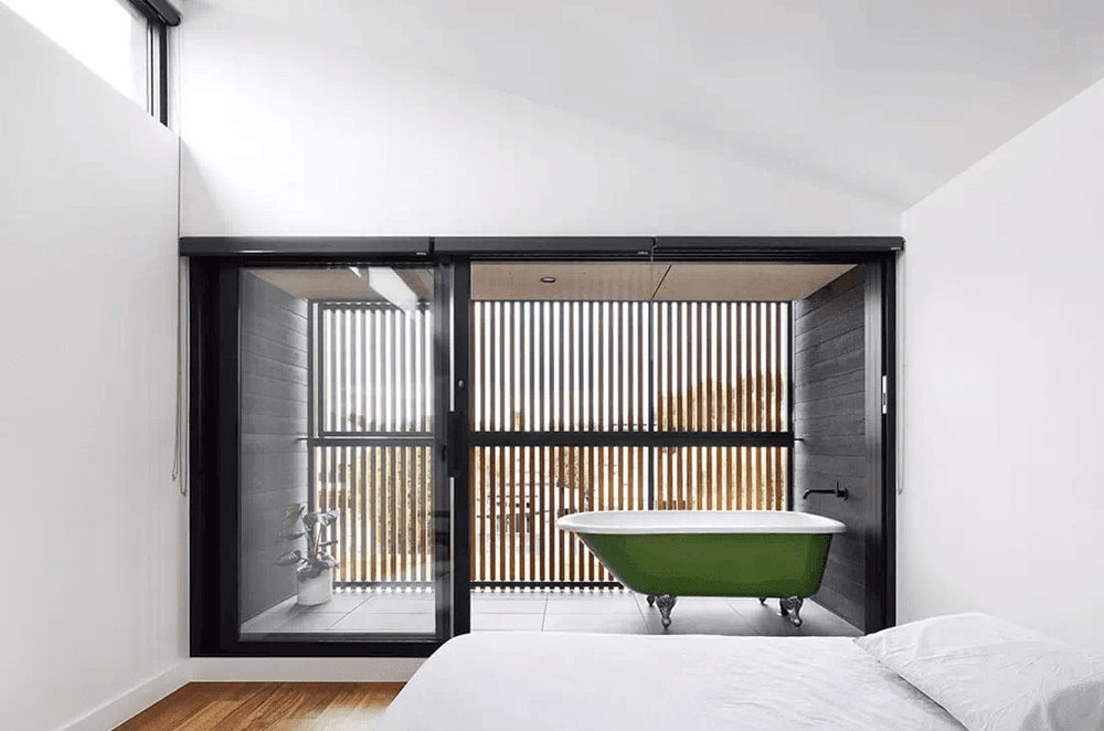 For this client, one of the must-have features was an upstairs bathroom with an open-air clawfoot bathtub.