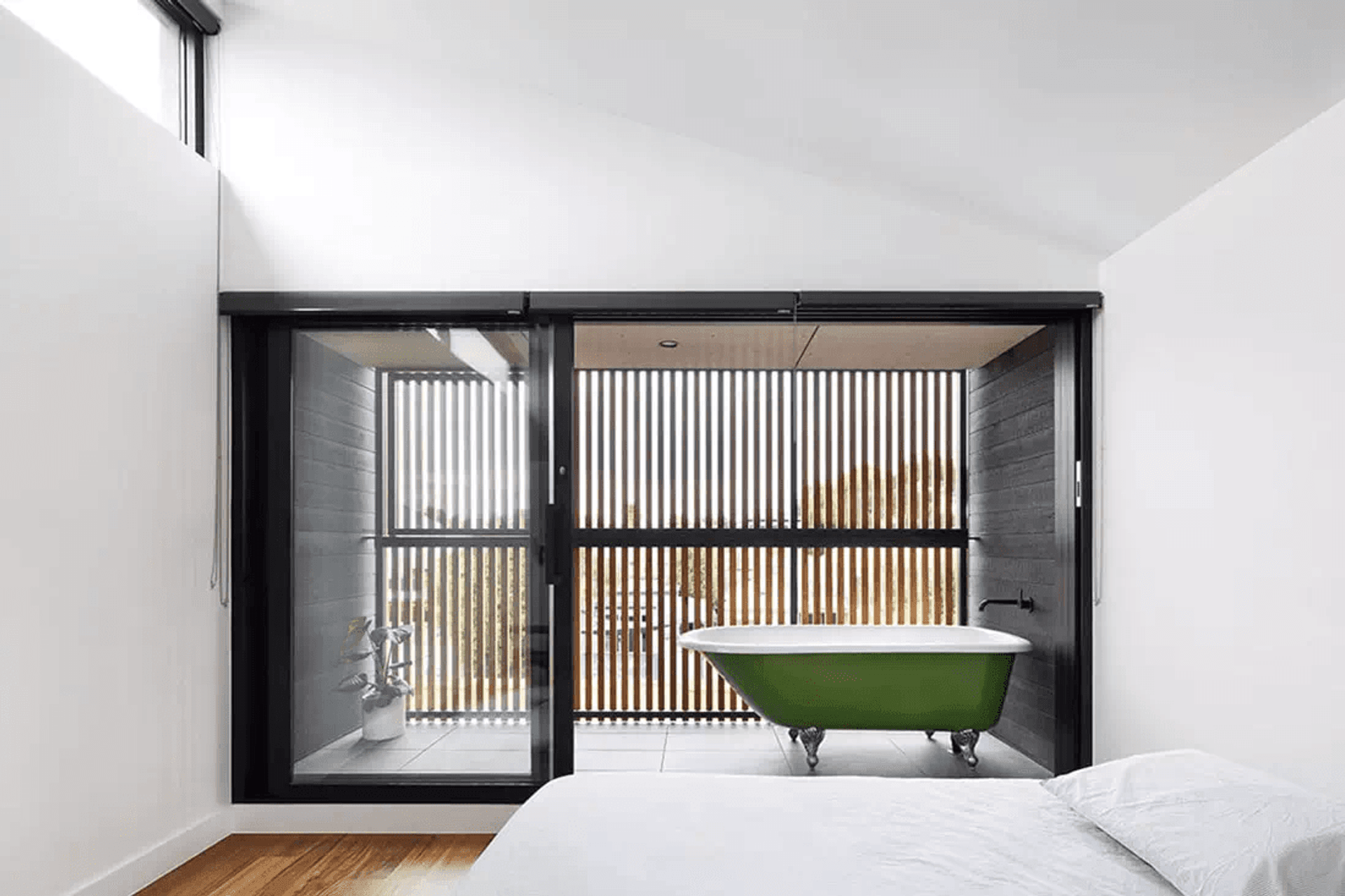 For this client, one of the must-have features was an upstairs bathroom with an open-air clawfoot bathtub.