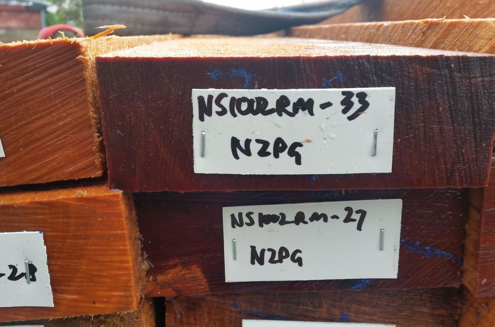Tagged native timber flitches awaiting being sliced into veneers to create panels for cabinetry.