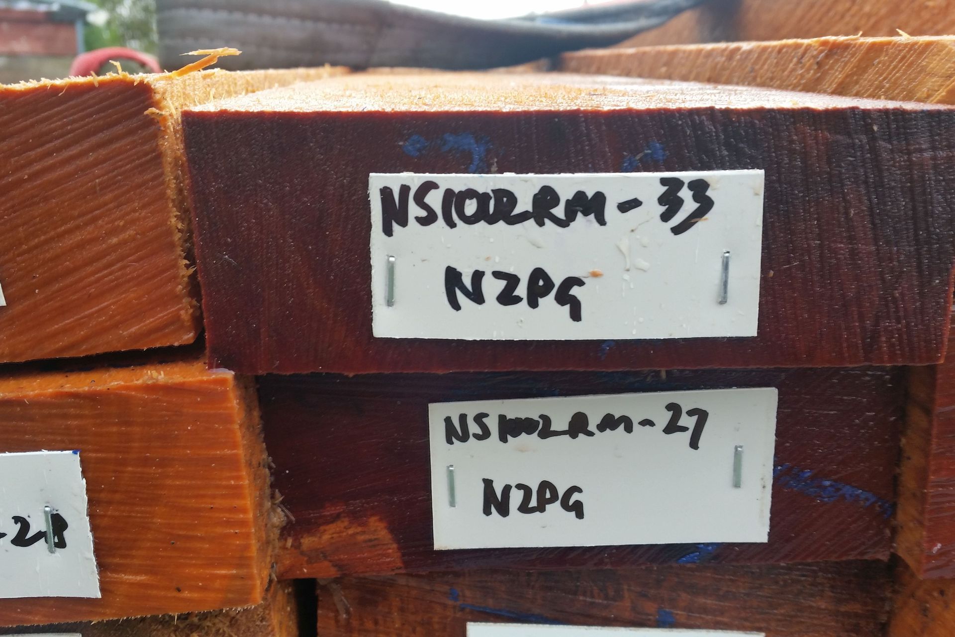 Tagged native timber flitches awaiting being sliced into veneers to create panels for cabinetry.