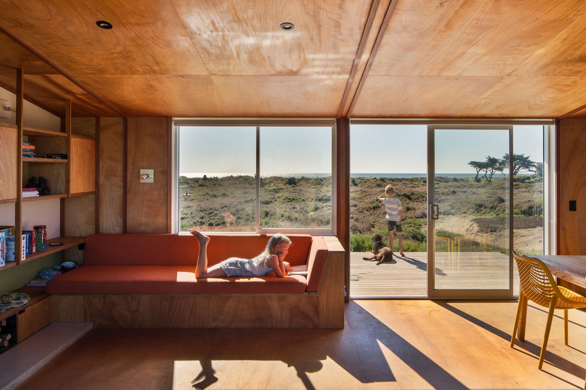 Parsonson Architects' design of Te Horo Beach House responds to the surrounding sand dunes with bach-style living, materials and colours that respond to the local environment. Photograph by Paul McCredie.