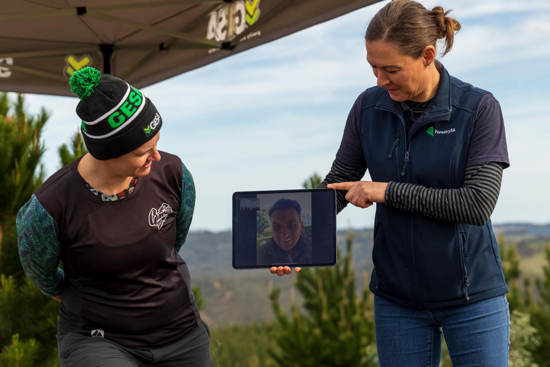 Kate Holdrook Gravity Enduro SA Coordinator (left) and Monique Blason Manager of Community Services, Forestry SA (right) and Jason Ross, Marketing and Communications Officer for Responsible Wood (centre) at the Bennett’s Forest Reserve in the Adelaide Hil