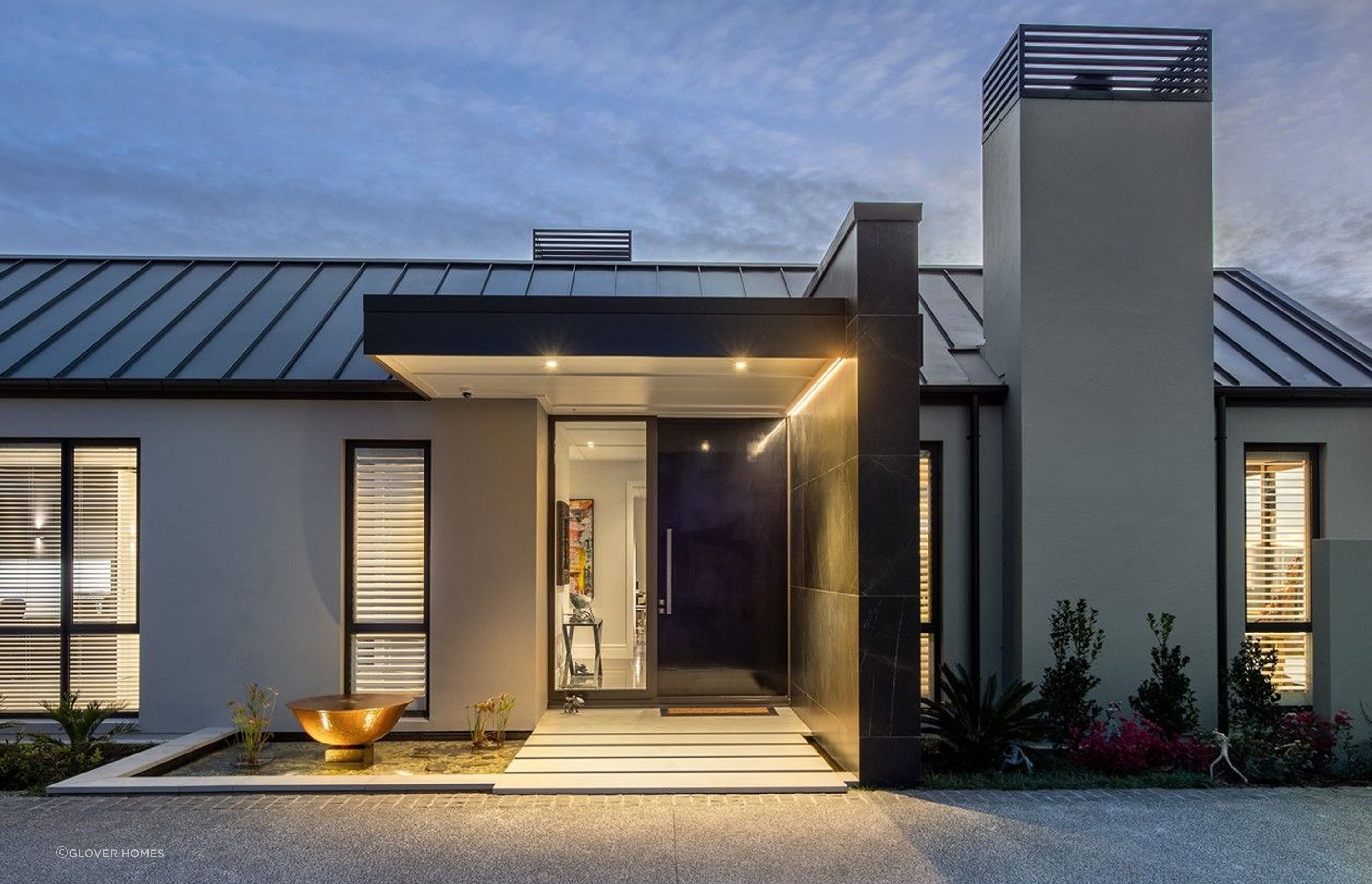 Designer flair with the combined use of downlights and LED strip lights in this family home north of Auckland