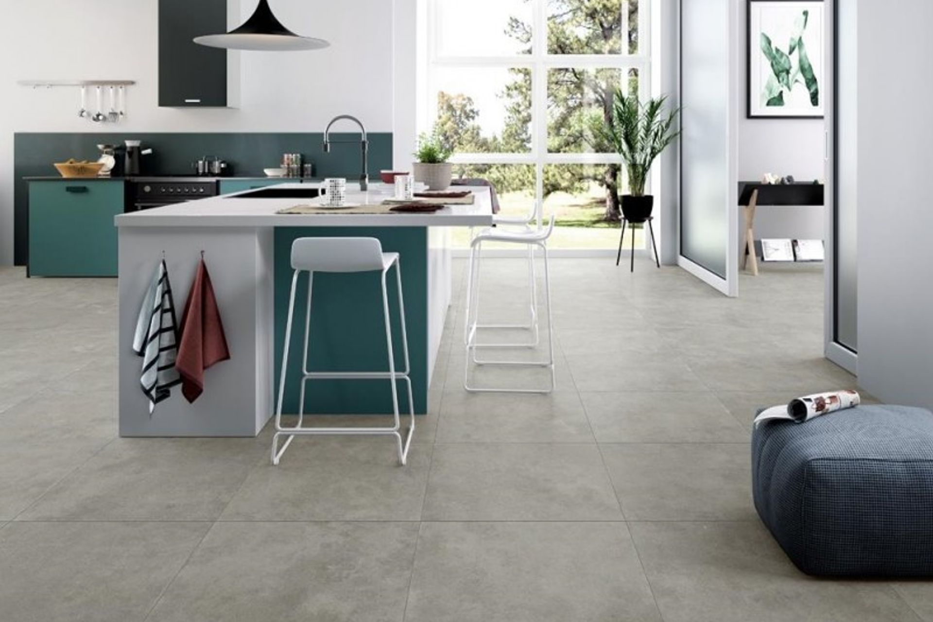 Another example of Glazed Porcelain tiles with a natural stone look. These matte tiles have been installed throughout the living area as well as the kitchen floors to give a unified look. (Tile Depot, 2021)