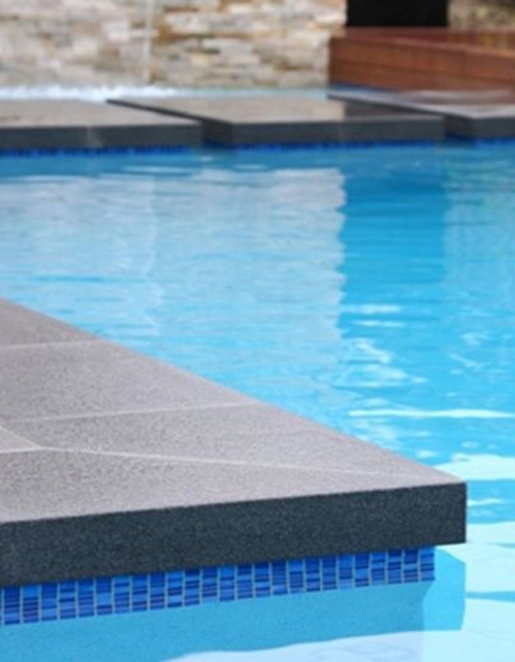 Drop Edge Granite Pool Coping | Malibu Pools