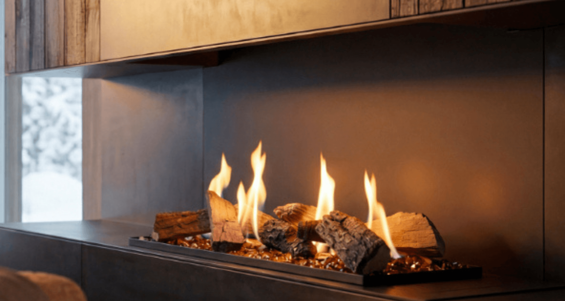 Decoflame LogicWood Series available in 720, 920 and 1120 sizes. Modern luxury interior featuring a Decoflame BEV (Burning Ethanol Vapour) Fireplace, a gas fireplace alternative for all-electric homes, apartments and sustainable architectural developments in Australia.
