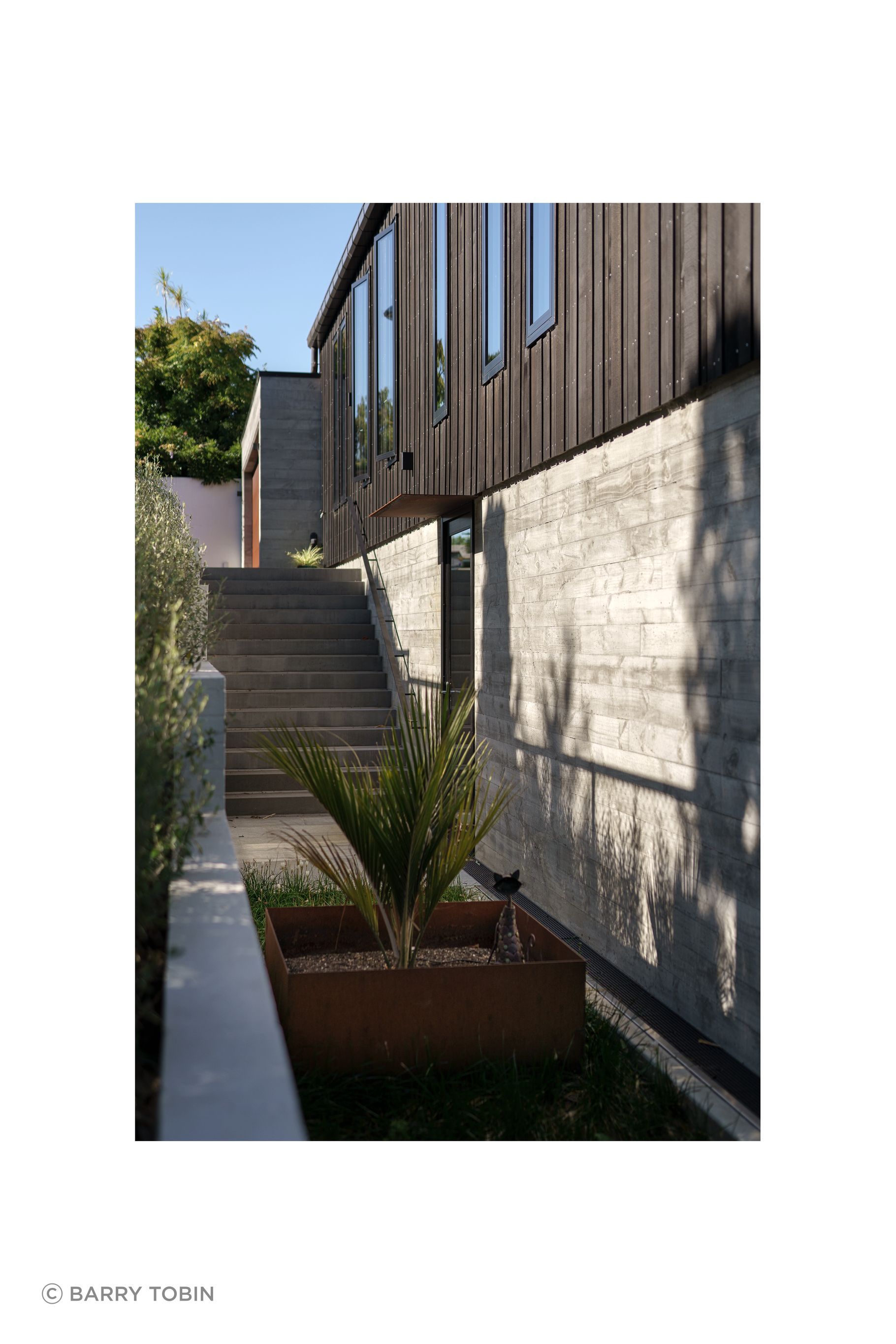 The house was positioned so a driveway could fit down the side, in case of future development of the large site.
