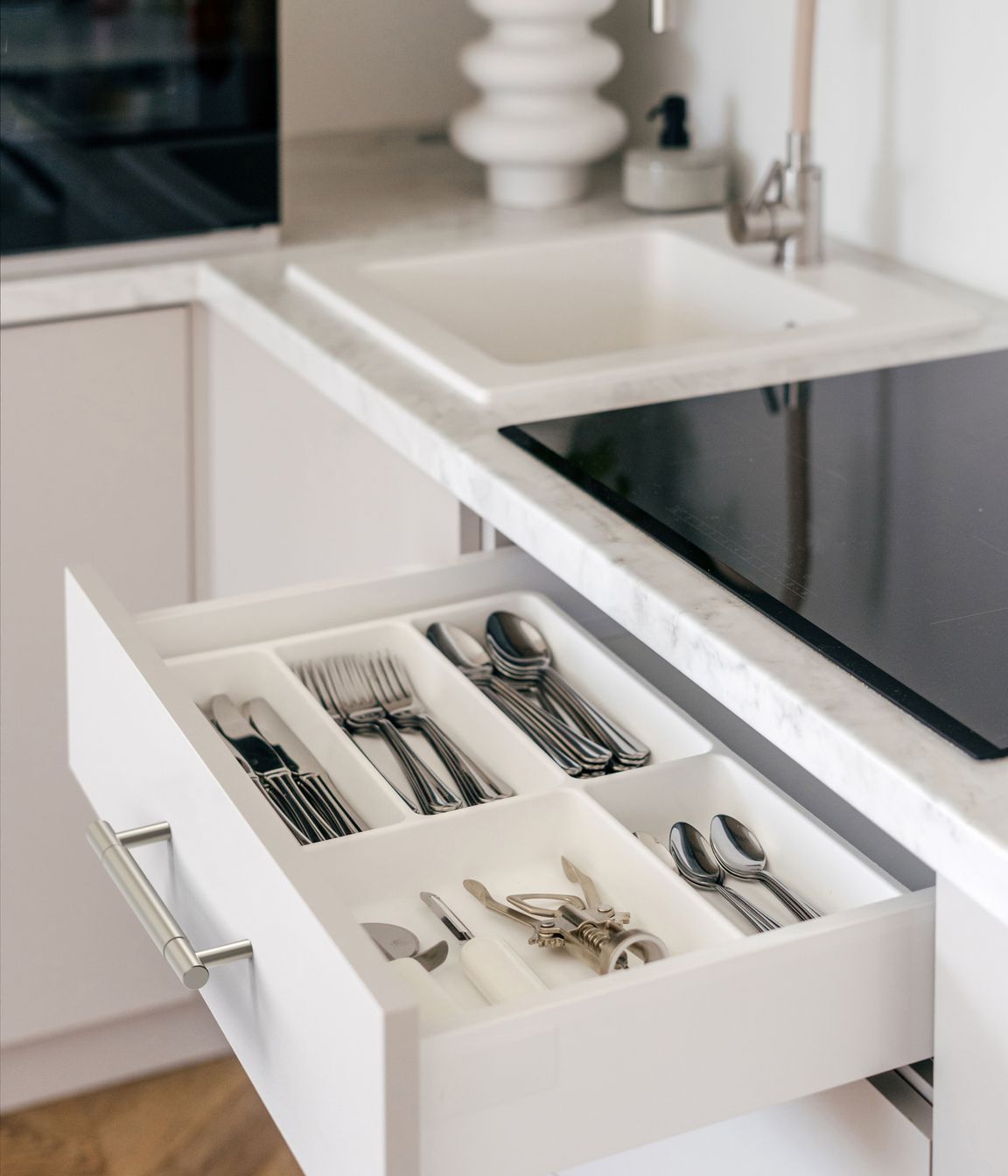 In Brushed Nickel, the small size handle is perfect in a contemporary white kitchen.