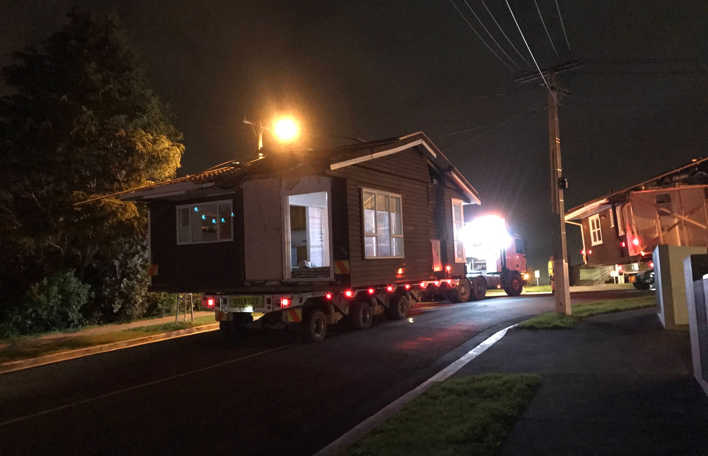 The existing house was transported to Hastings to be repurposed in a new development.