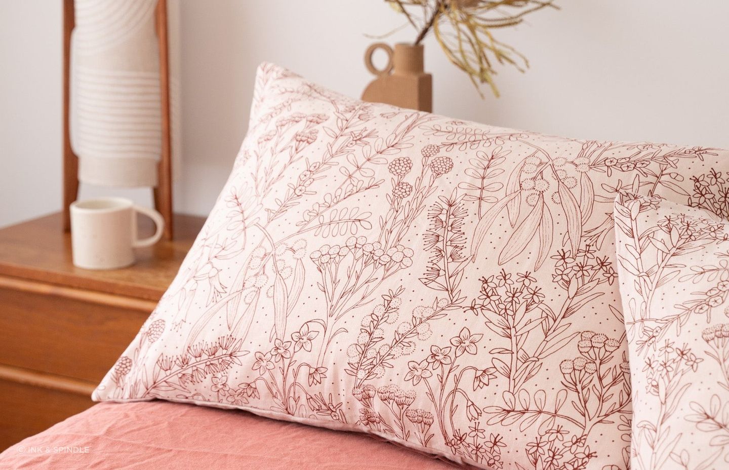 Pillows each have their own upkeep requirements but will last longer with a high-quality pillow protector or pillow case, ideally one as gorgeous as this Merri Creek in Blush design