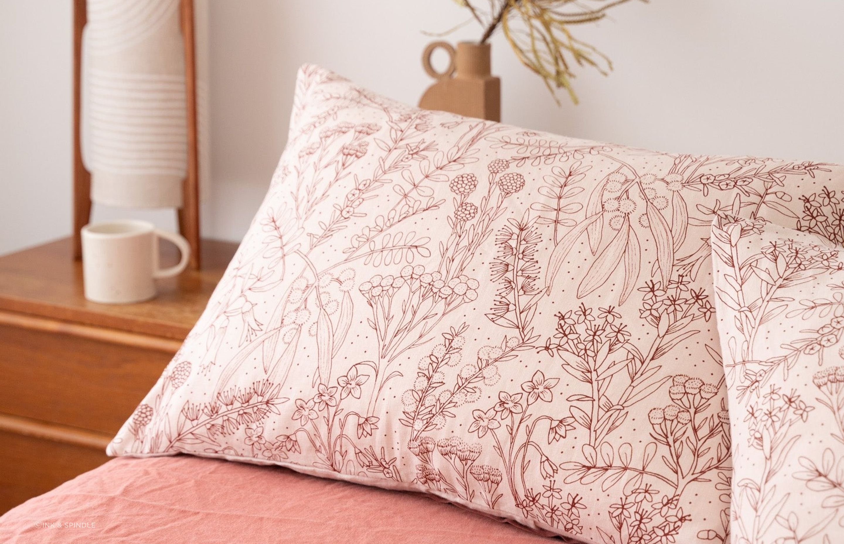 Pillows each have their own upkeep requirements but will last longer with a high-quality pillow protector or pillow case, ideally one as gorgeous as this Merri Creek in Blush design