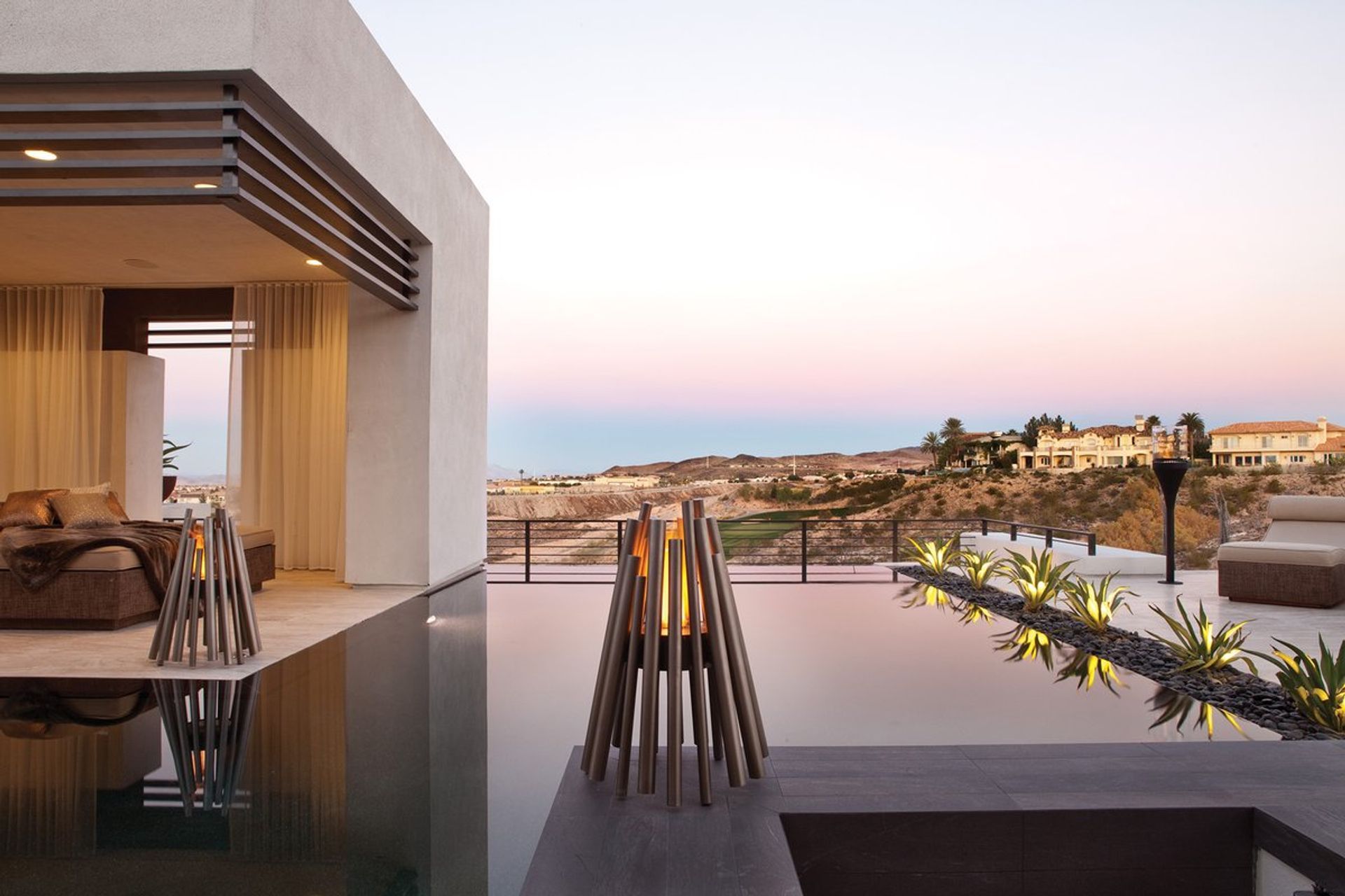 Create a visually striking and practical fire with the Ecosmart Stix Portable Fire Pit from Wellington Fireplace Studio.