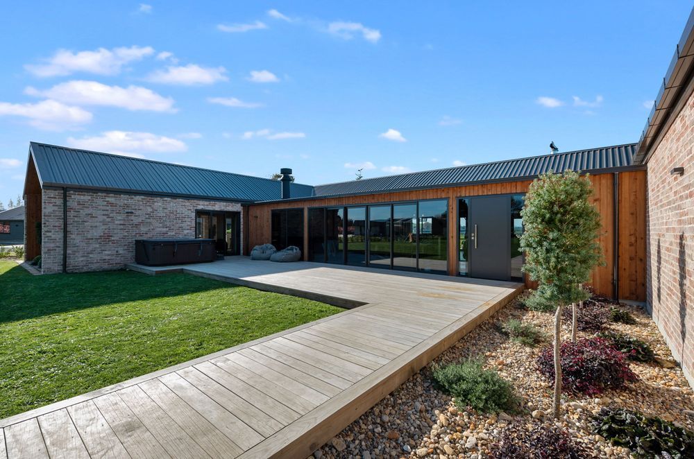 The concept for the house pivoted around the covered courtyard, with children’s rooms in one wing and master in the other. “I'm really happy that we did get the best bang for buck with the layout. It's all come together,” says Rob.