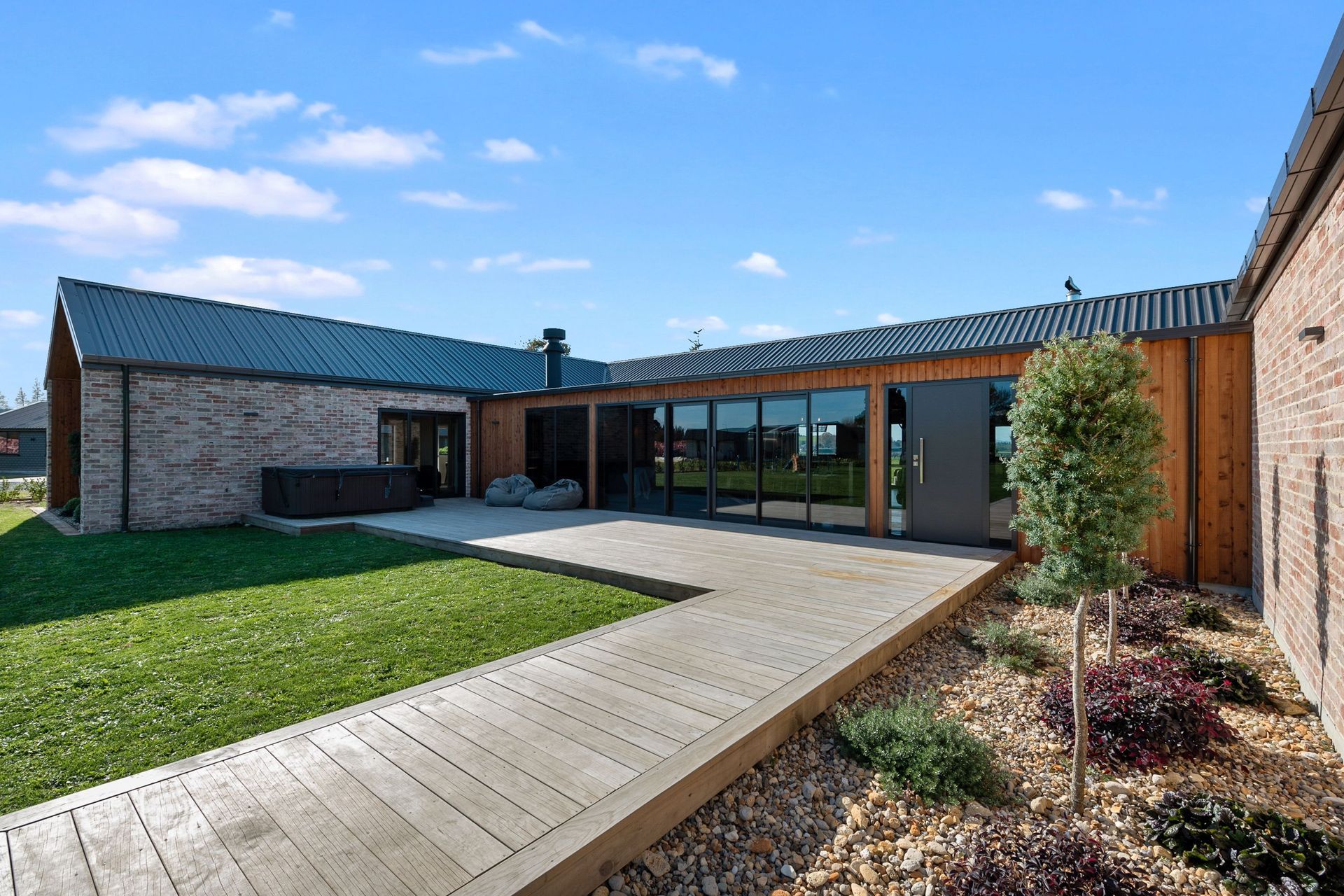 The concept for the house pivoted around the covered courtyard, with children’s rooms in one wing and master in the other. “I'm really happy that we did get the best bang for buck with the layout. It's all come together,” says Rob.