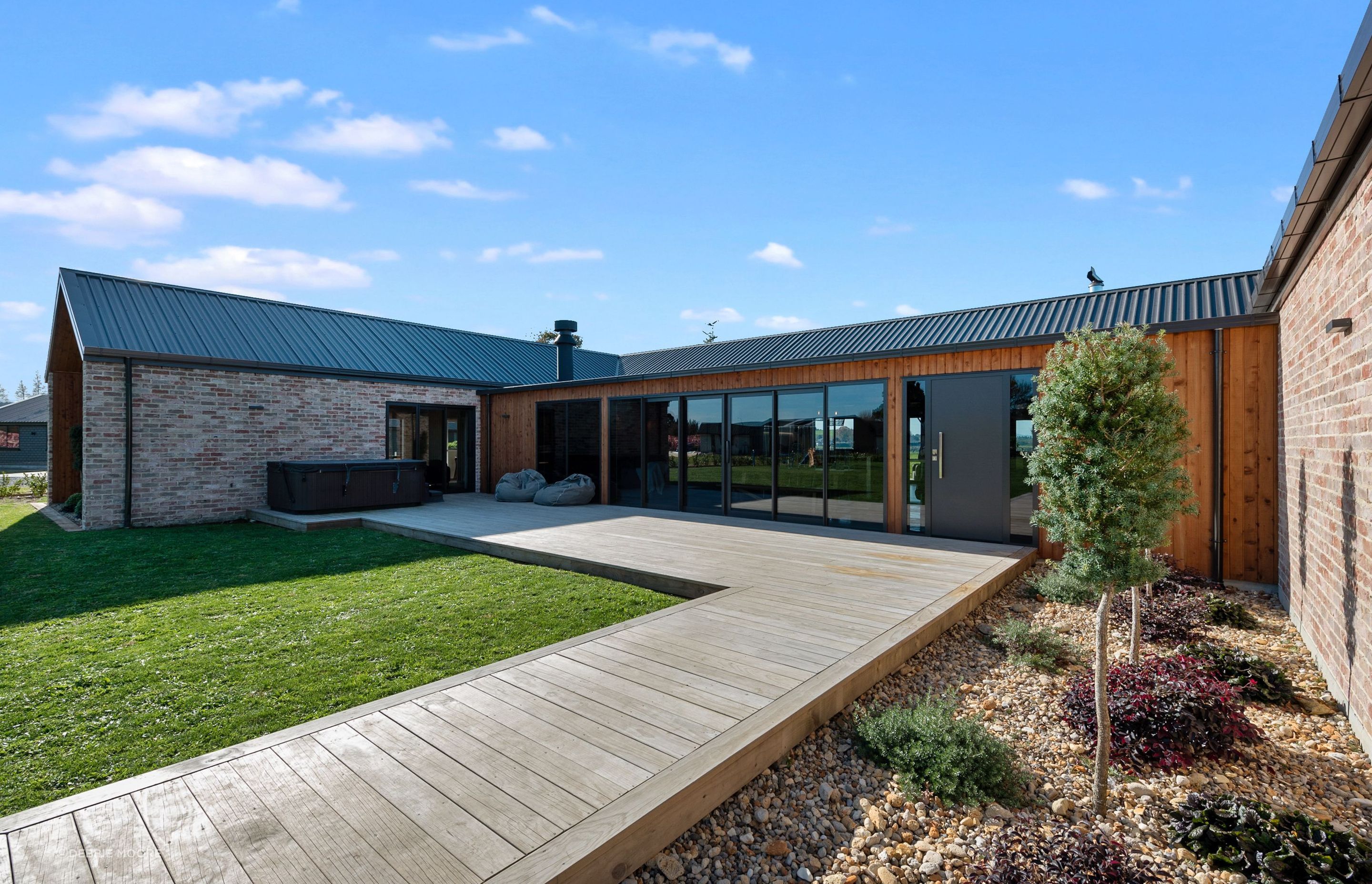 The concept for the house pivoted around the covered courtyard, with children’s rooms in one wing and master in the other. “I'm really happy that we did get the best bang for buck with the layout. It's all come together,” says Rob.