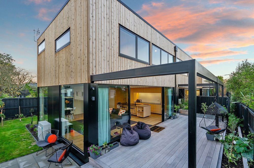 A great example of vertically aligned wood cladding using JSC Rustic Cedar.