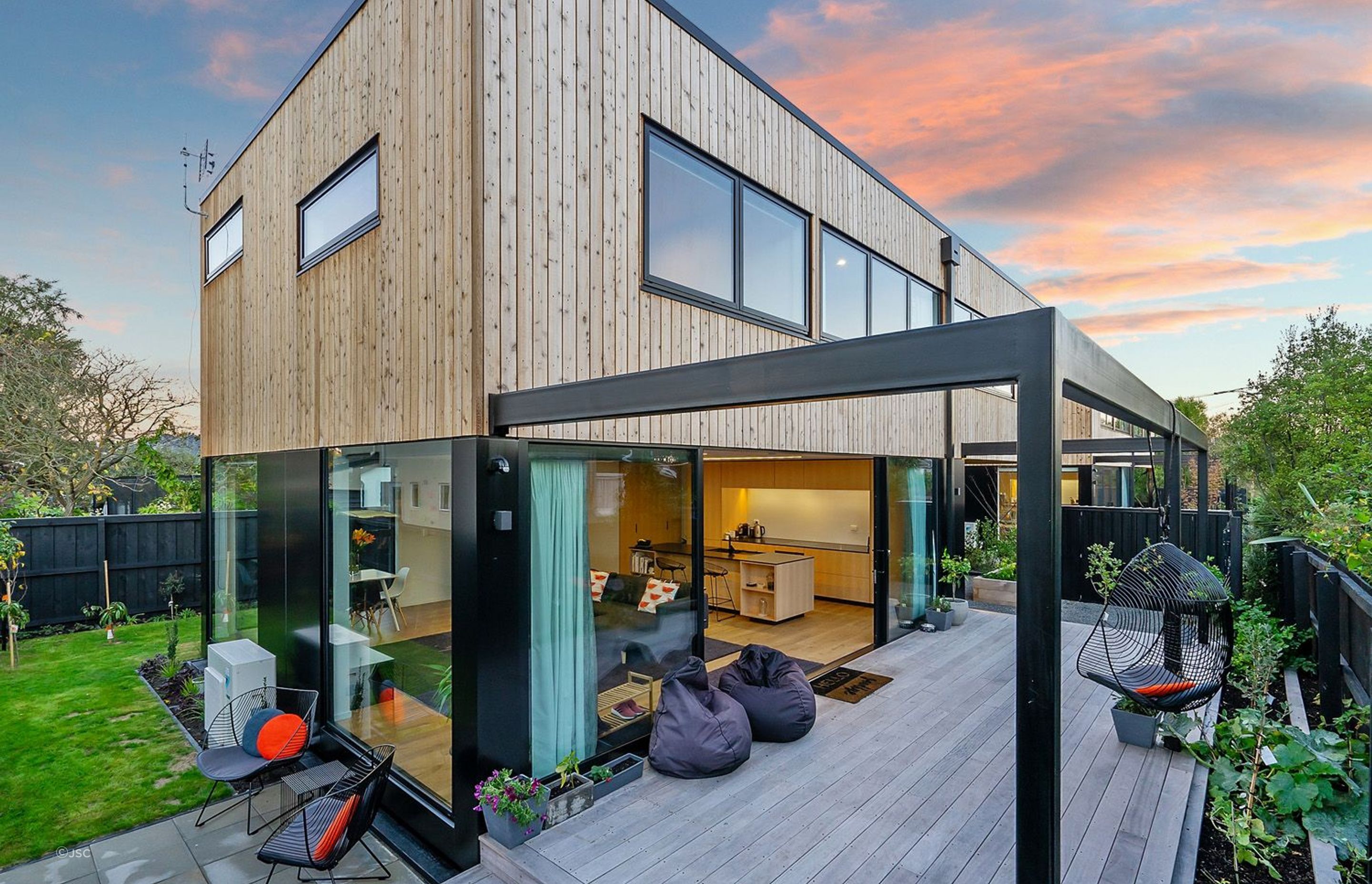 A great example of vertically aligned wood cladding using JSC Select Tight Knot Cedar