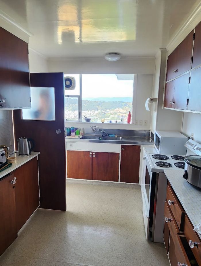 The kitchen—once a cramped and aging space