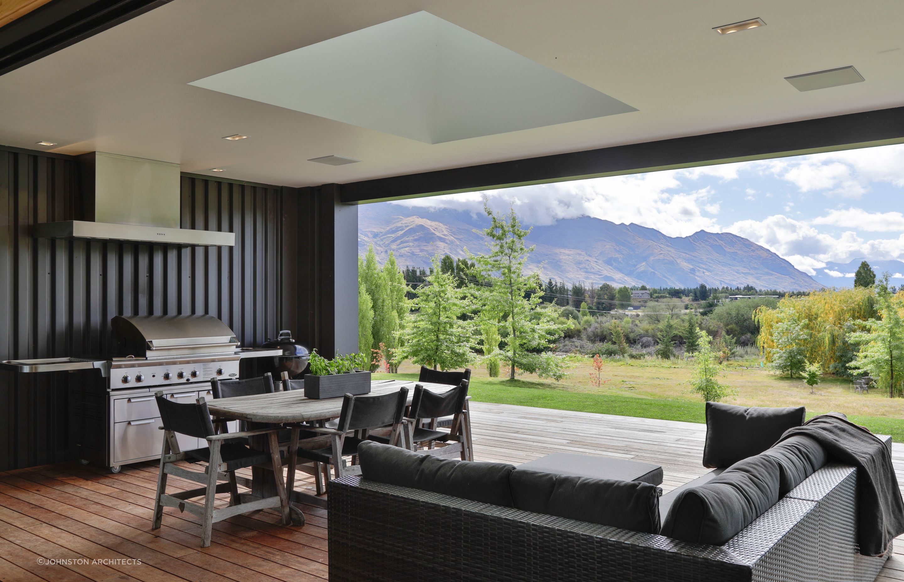 A sheltered outdoor living space with spectacular mountain views