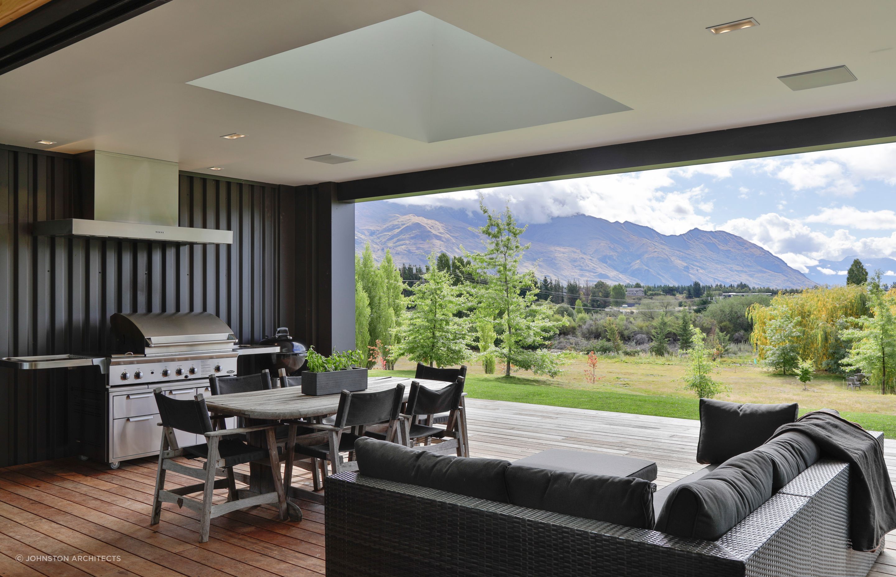 A sheltered outdoor living space with spectacular mountain views