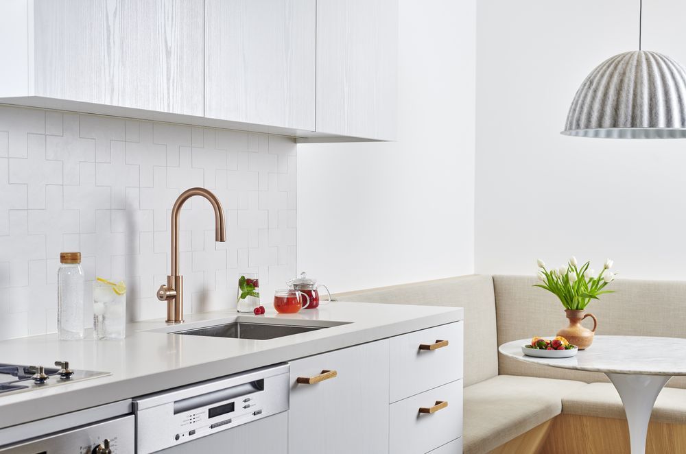 In contrast, the HydroTap Arc Plus has a curved design.
