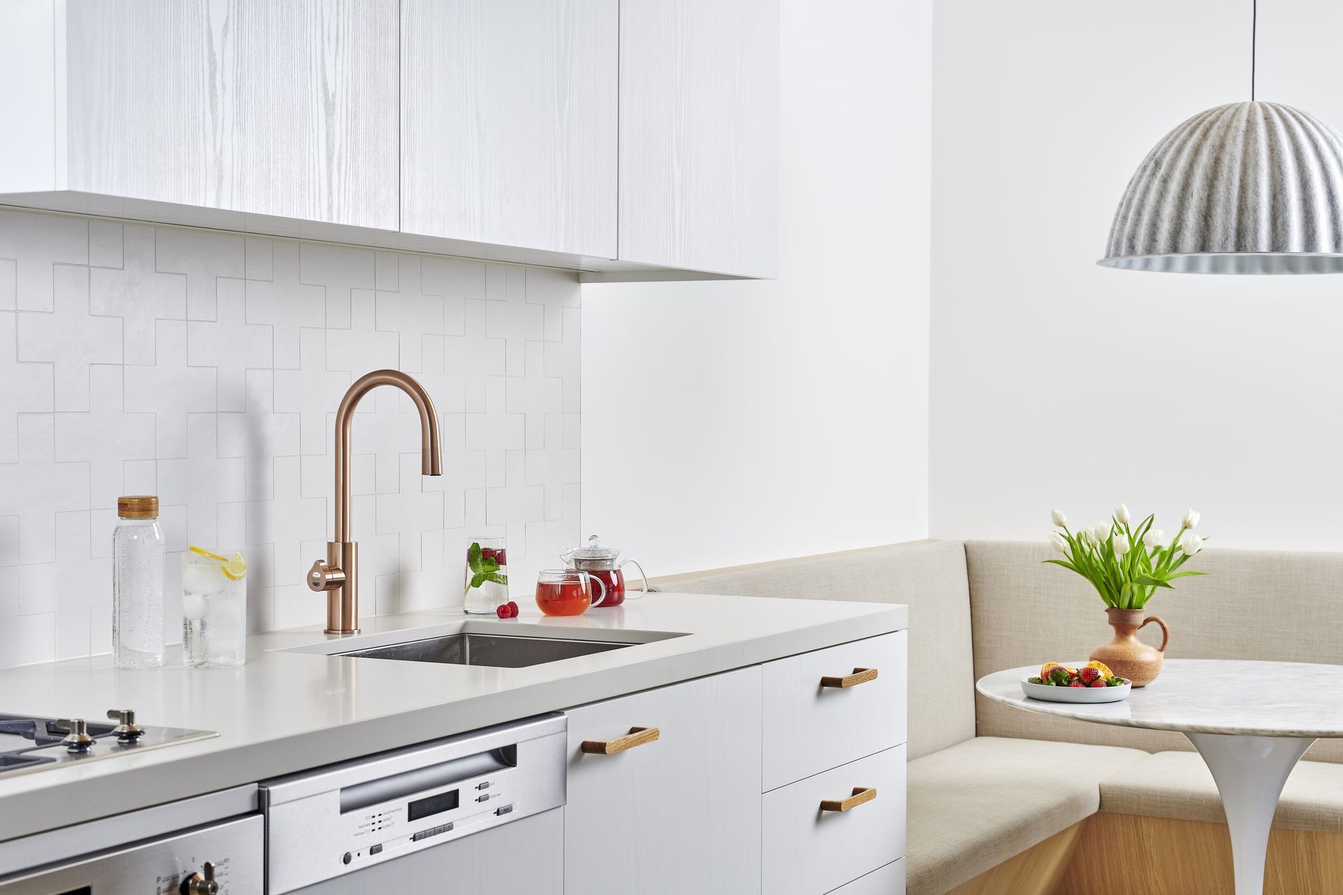 In contrast, the HydroTap Arc Plus has a curved design.