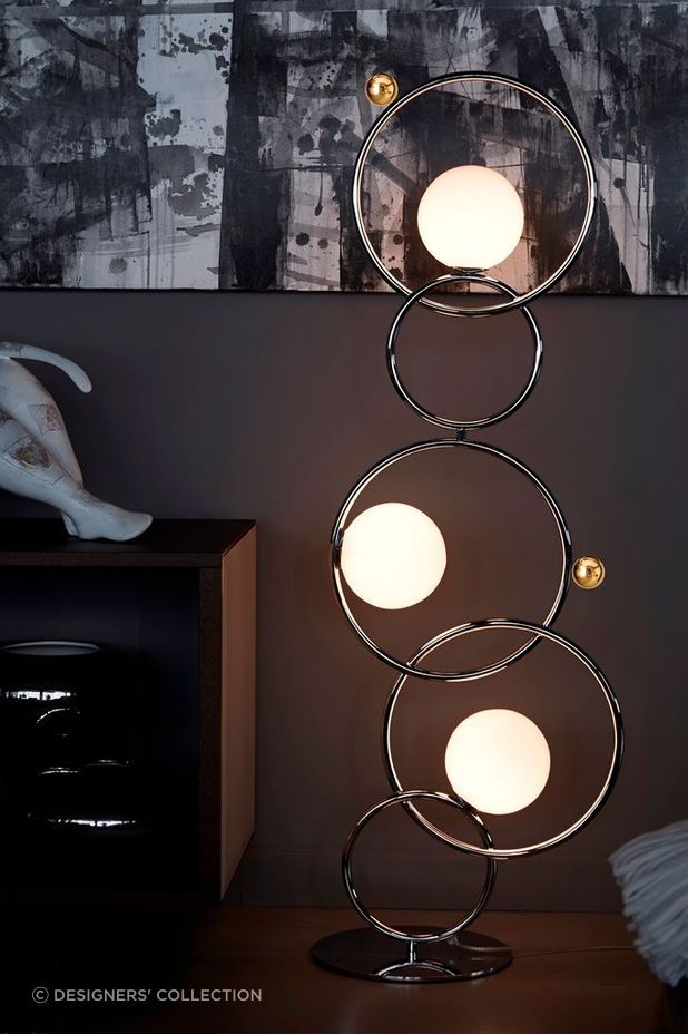 Diffused light and designer credentials with the Zoe Floor Lamp from Designer's Collection.