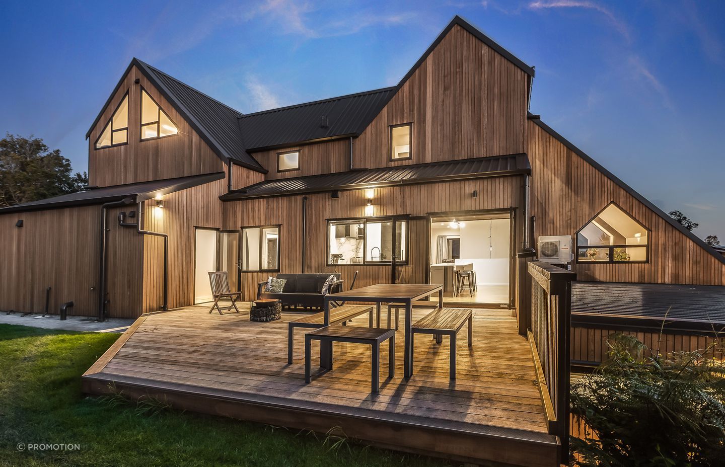 Exterior lighting was planned to highlight the home’s cedar cladding.