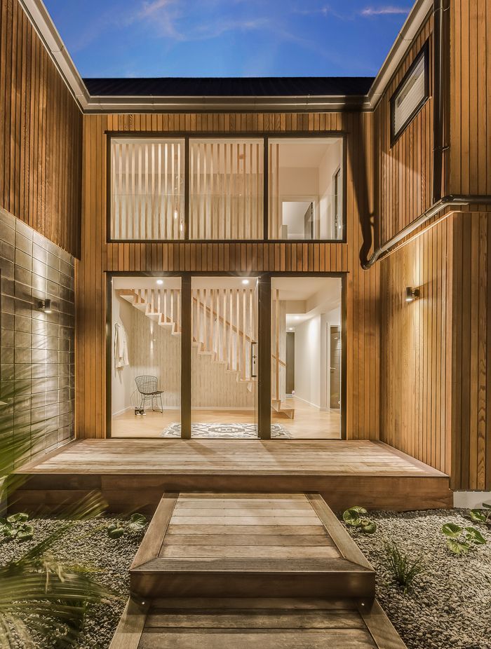 The entrance is one area where Tony recruited a professional: friend Jeremy Stratton of The Lawn Laying Company did the landscaping. “We thought it came up beautifully,” says Tony.