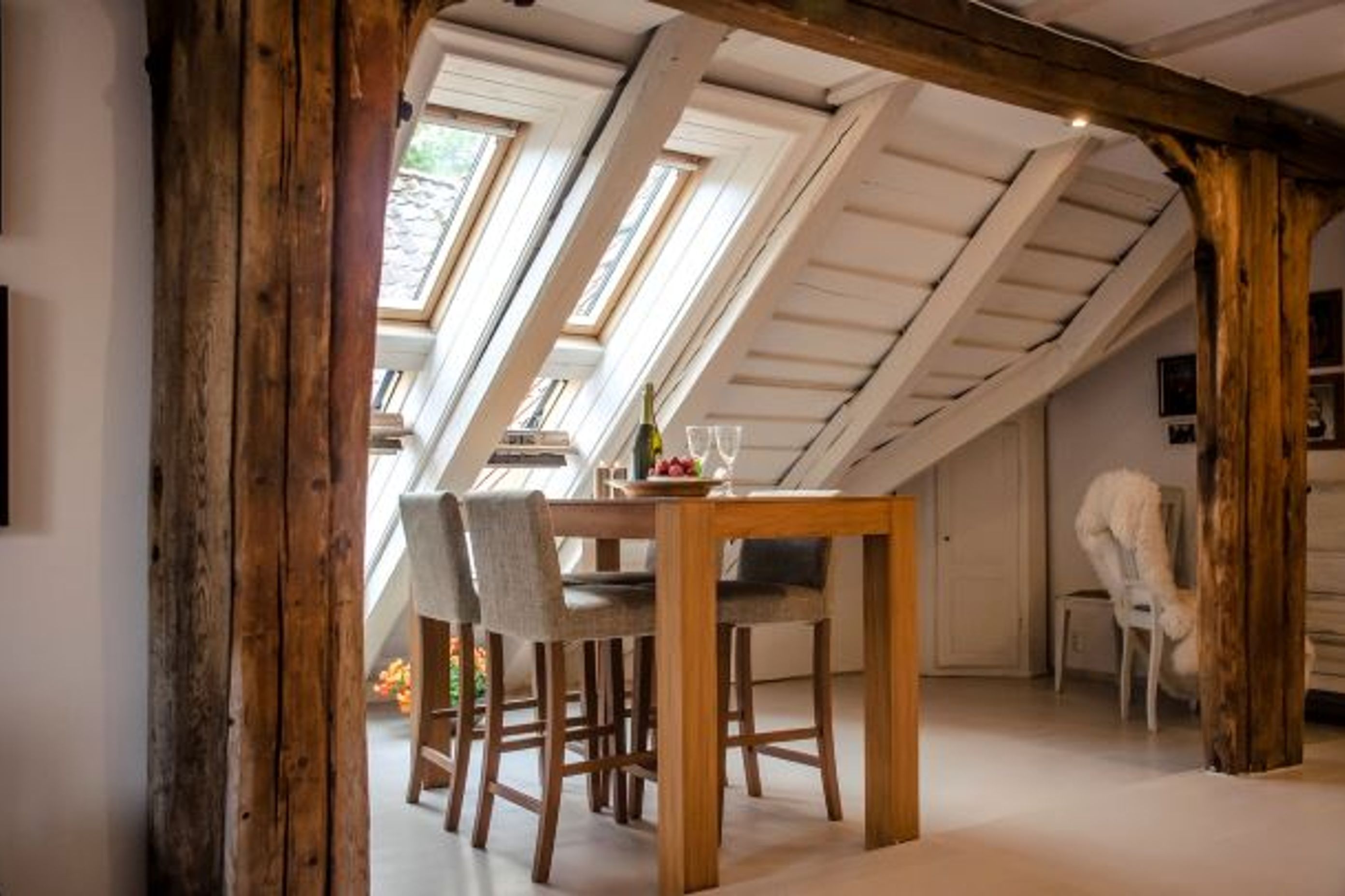 The skylights in this roof conversion makes the space look bigger and more open