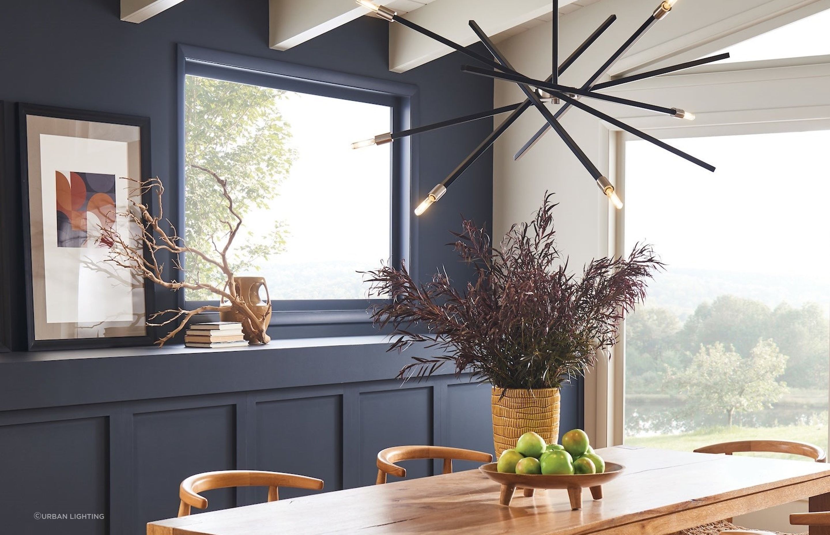 The versatile and contemporary Archer Pendant with articulating arms in satin black with brushed nickel accents