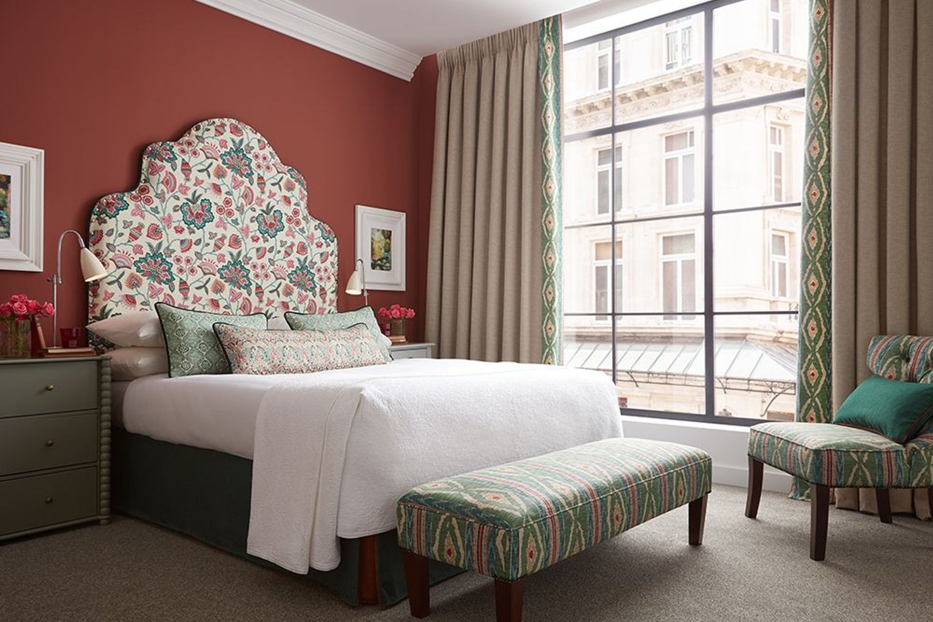 Playful pattern combinations add 'wow' factor to this bedroom.