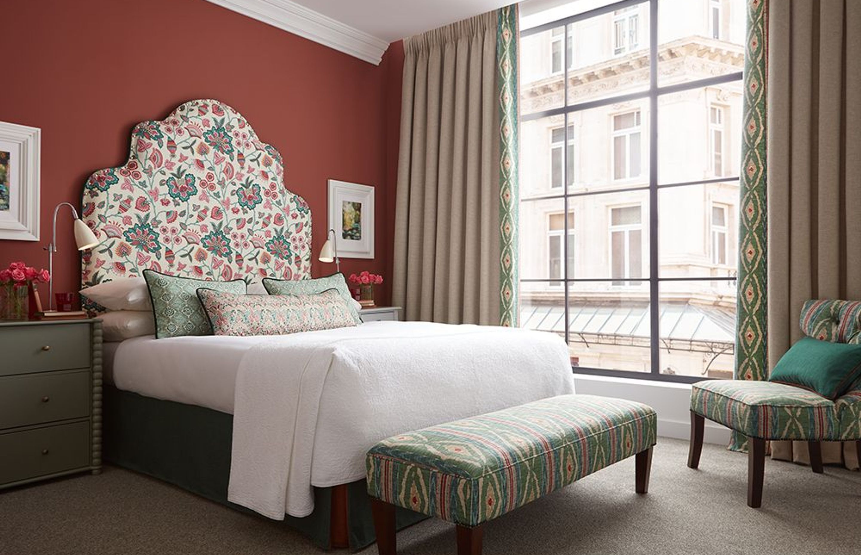 Playful pattern combinations add 'wow' factor to this bedroom.