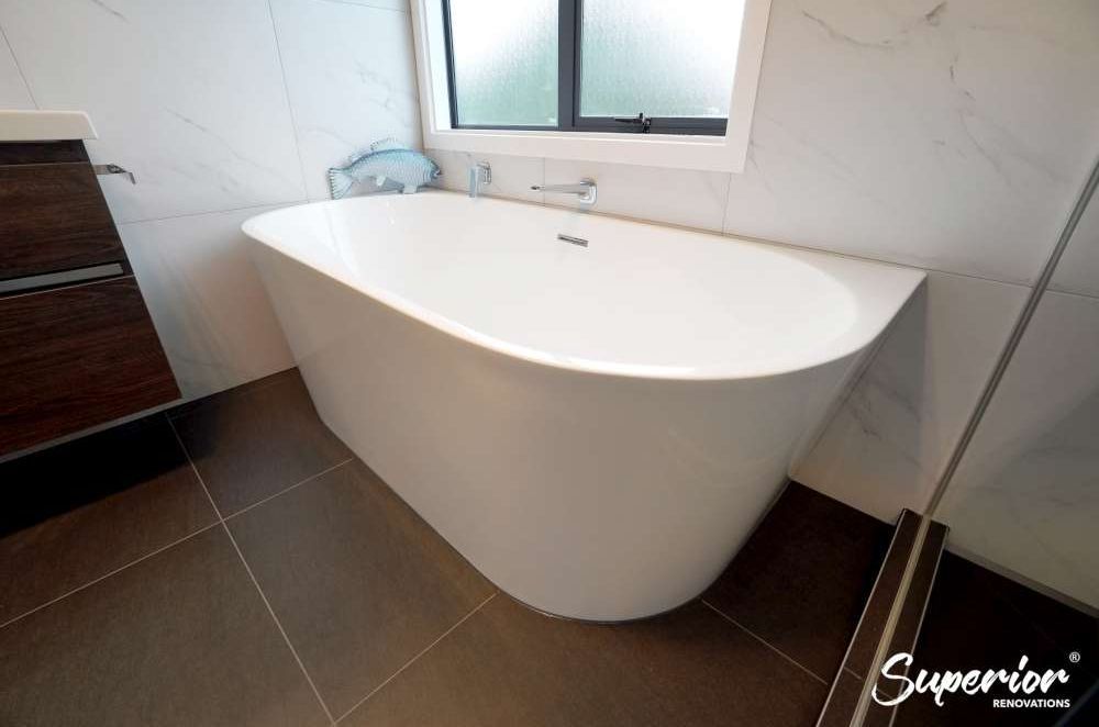 Oval shaped free stand standing bath in Albany