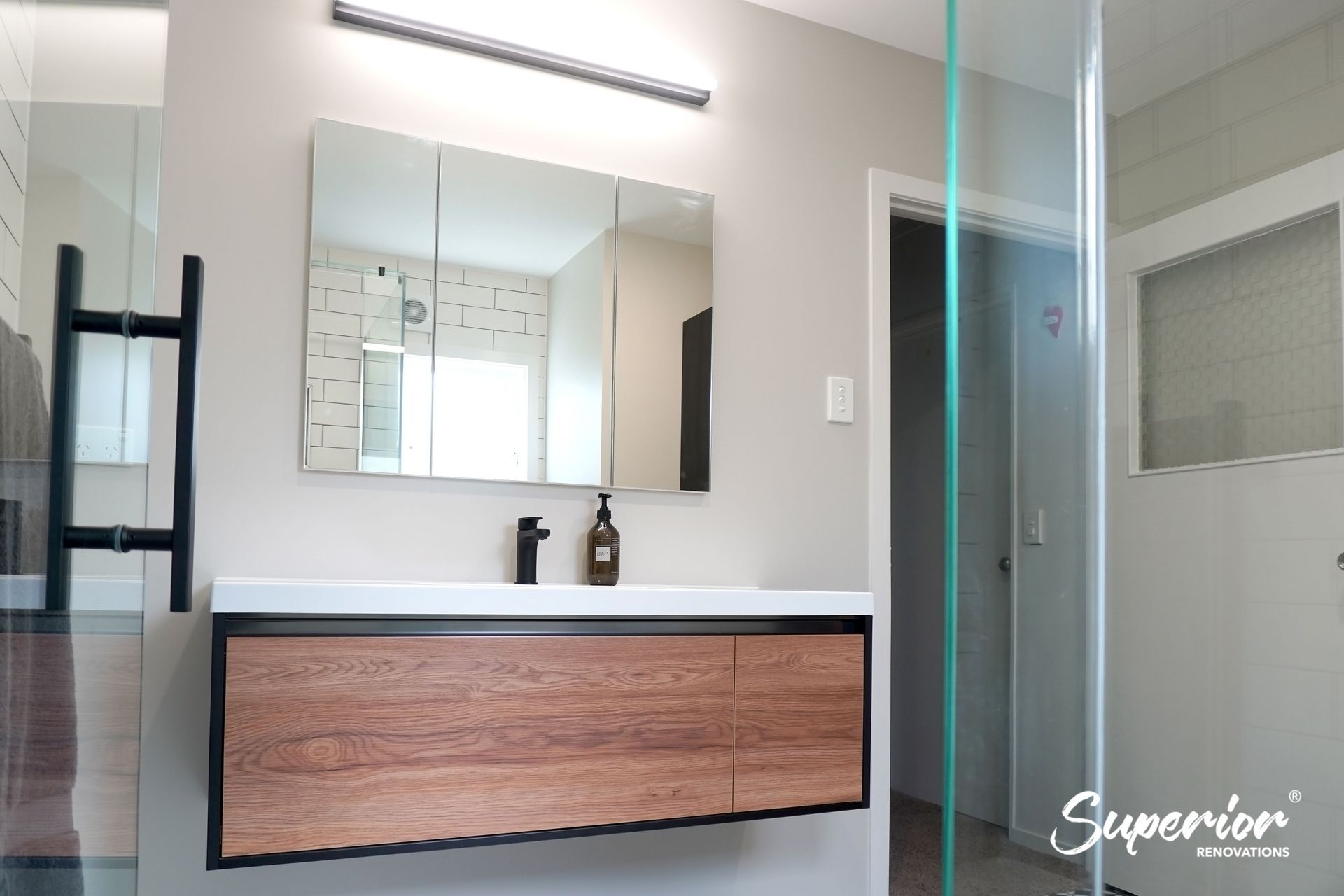 Floating wooden vanity in Titirangi