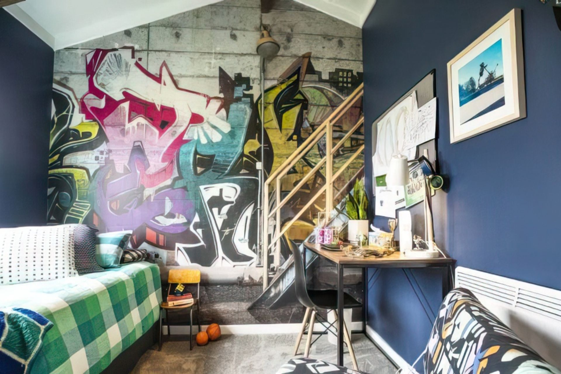 Carley Lloyd’s mother-in-law hung the graffiti wallpaper in nine-year-old Beau’s bedroom. The wallpaper was custom printed by Swedish company Rebel Walls.
