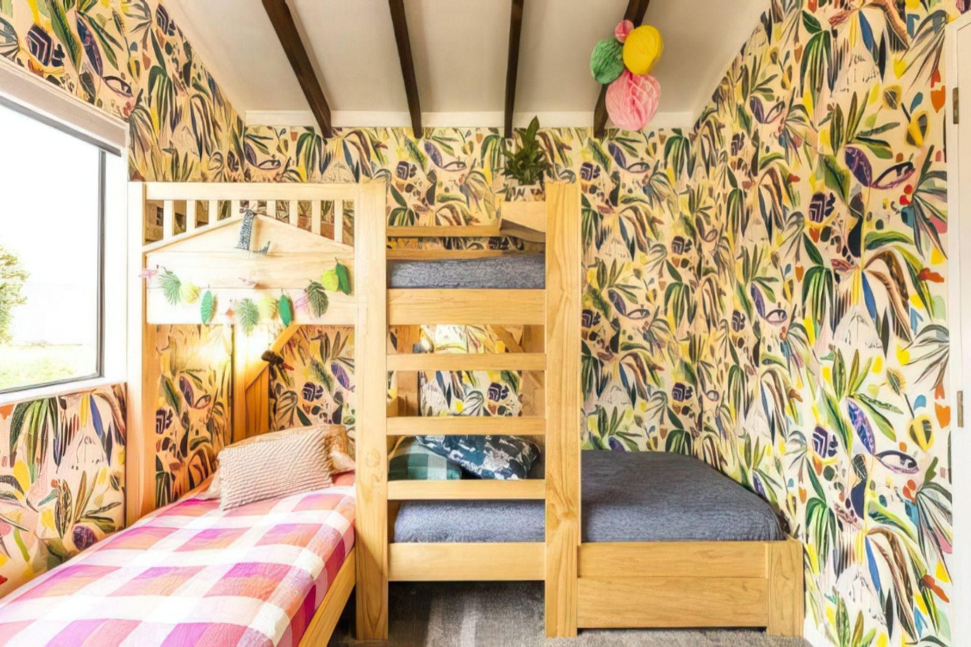 Lloyd says the key to mixing patterns is to know when to stop. She had had her eye on the Kitty McCall wallpaper for some time, but says it would not have worked in the Wellington house, but is perfect for Lilou and Felix’s room in the Mapua house. “People think it's full on doing all four walls in wallpaper, but I think you need a minimum of two,” Lloyd says. “It cocoons the space a bit more.”