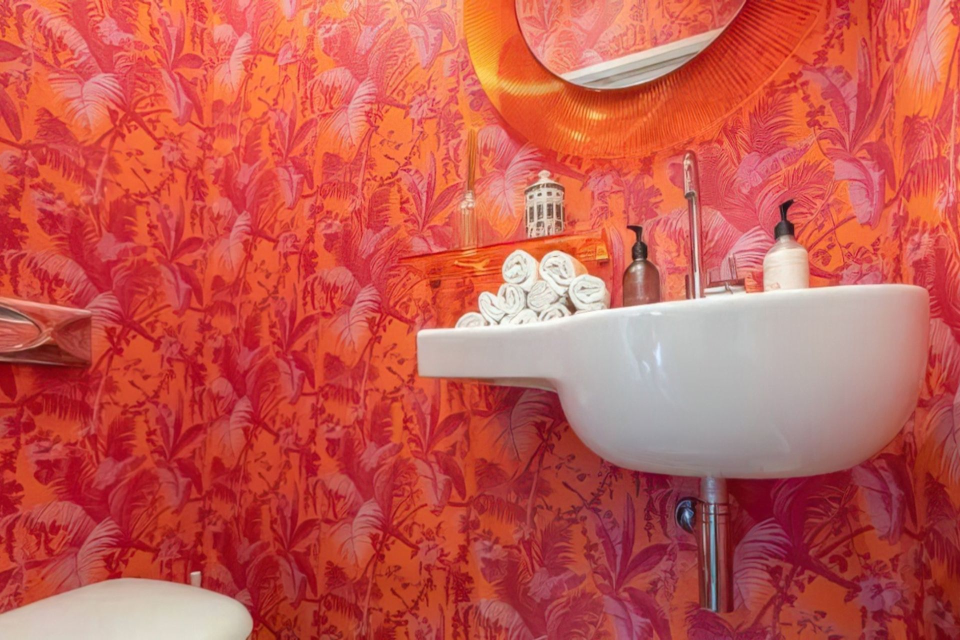 The brief for the powder room began with the mirror.