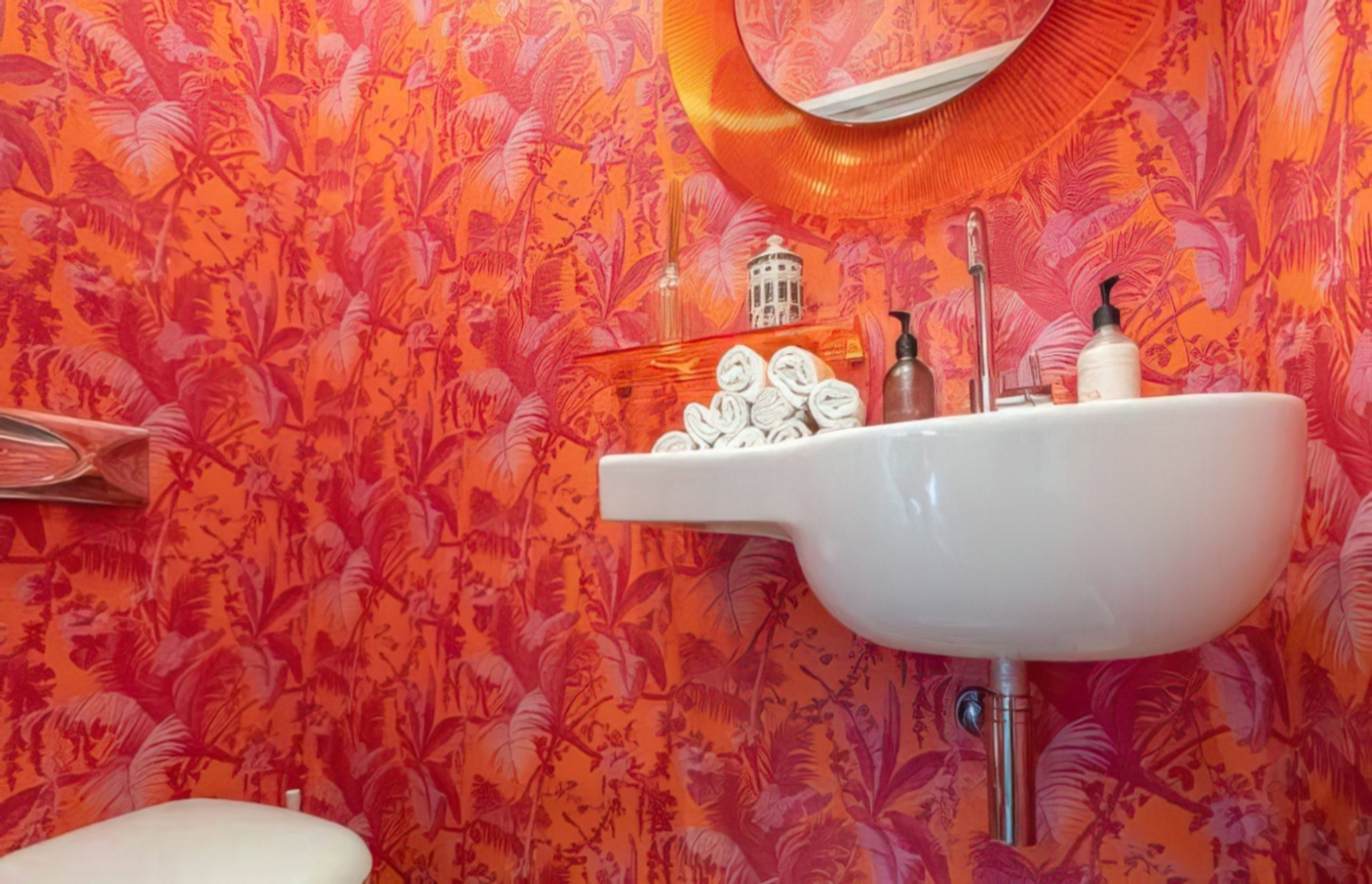The brief for the powder room began with the mirror.